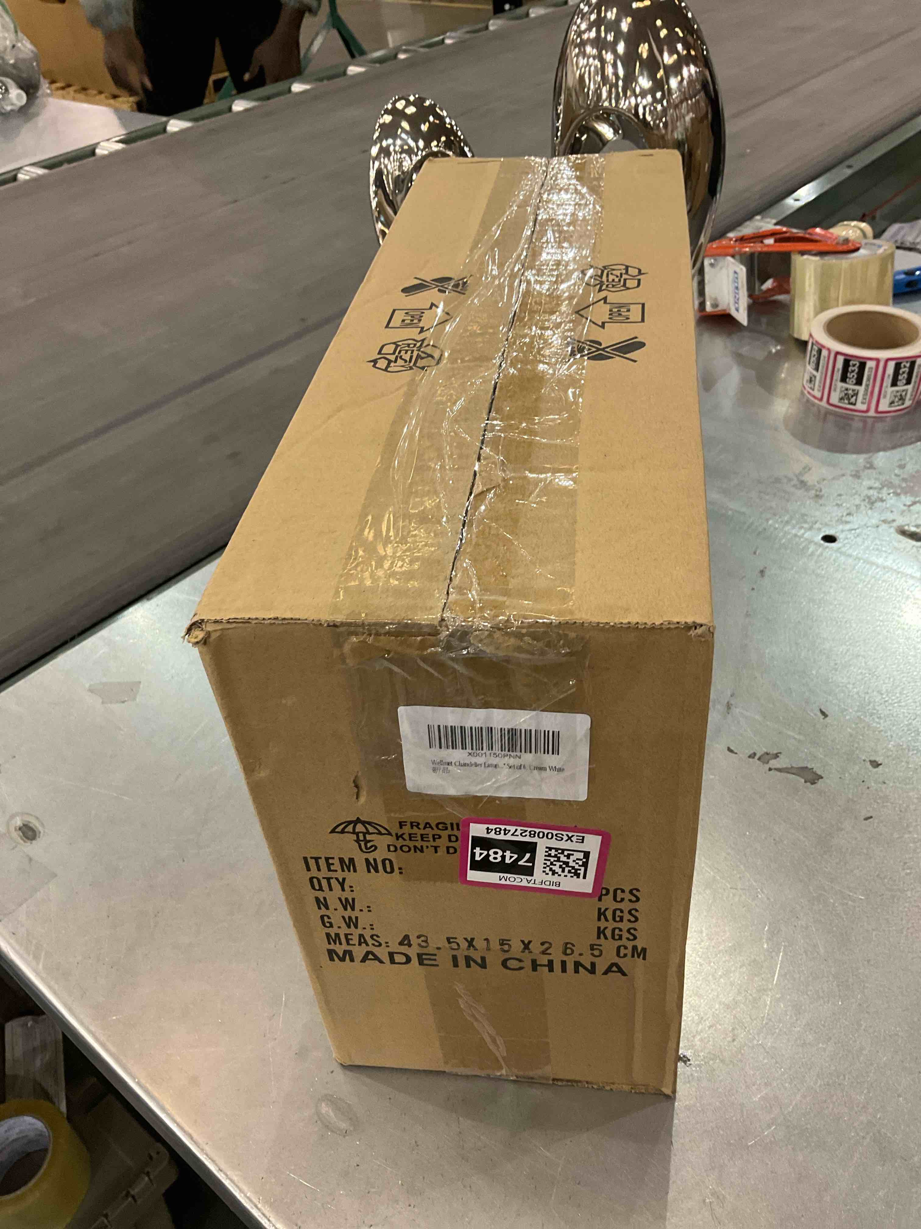 https://s3.amazonaws.com/lotting-images-prod/bidfta/EXS00827484_1699886981469.jpeg