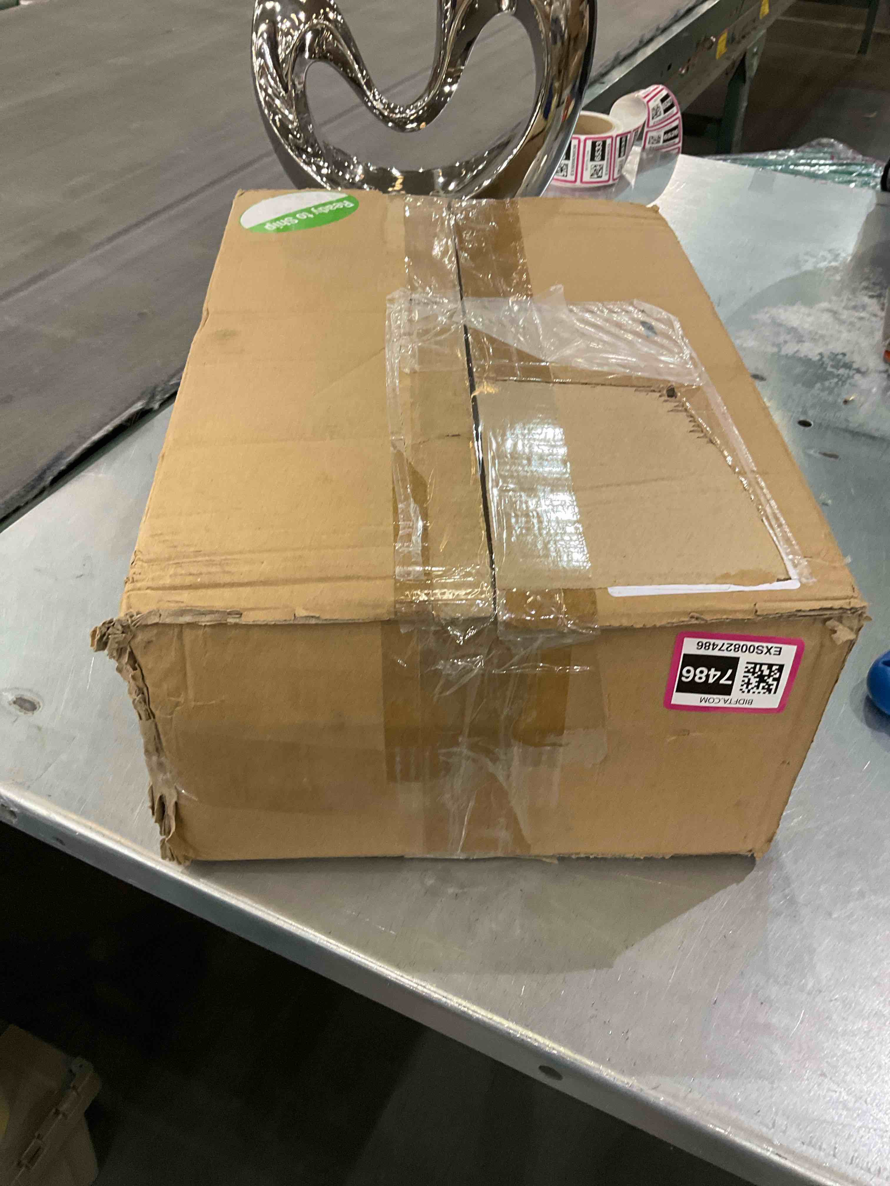 https://s3.amazonaws.com/lotting-images-prod/bidfta/EXS00827486_1699887127035.jpeg