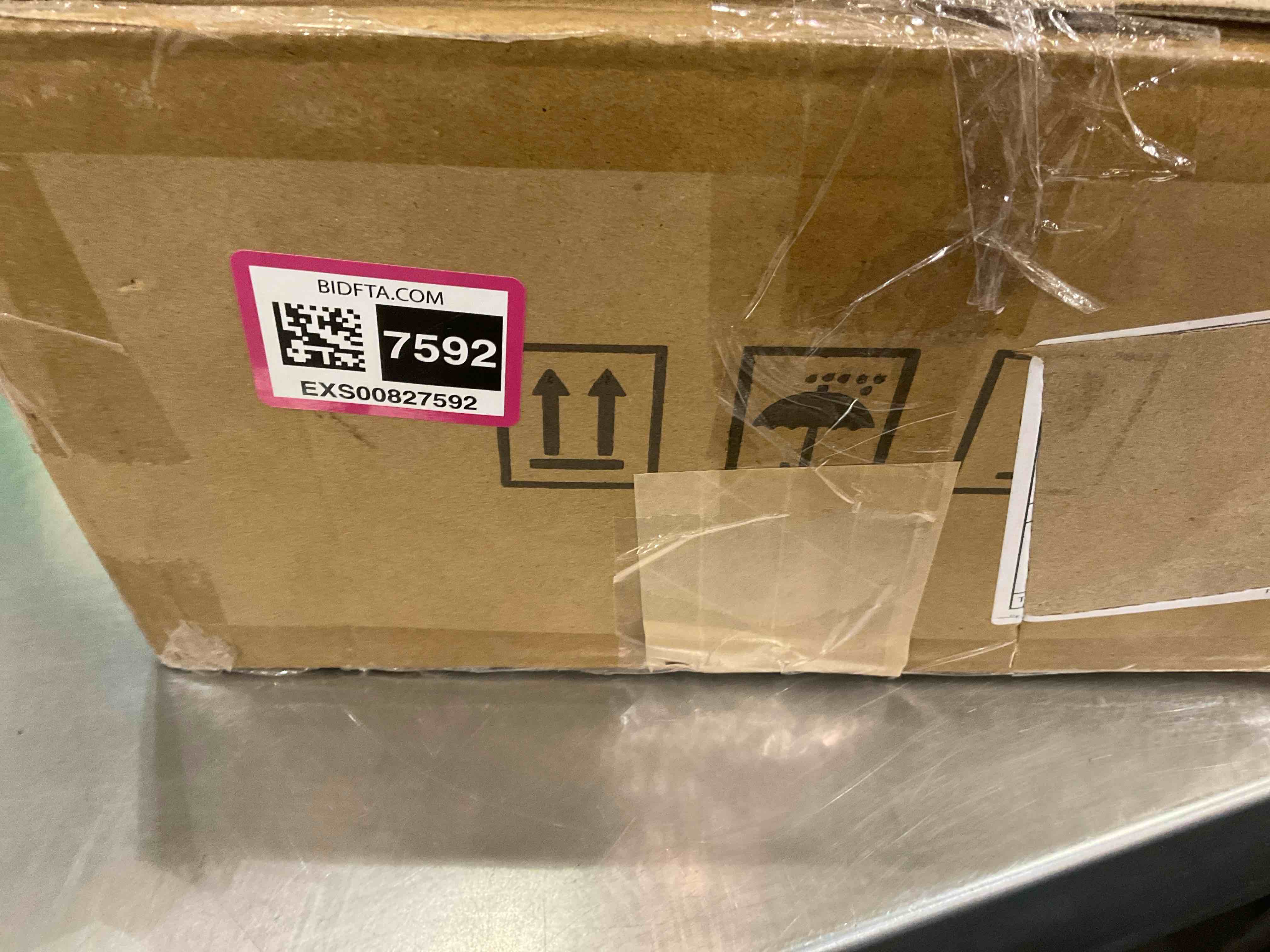 https://s3.amazonaws.com/lotting-images-prod/bidfta/EXS00827592_1699455696463.jpeg