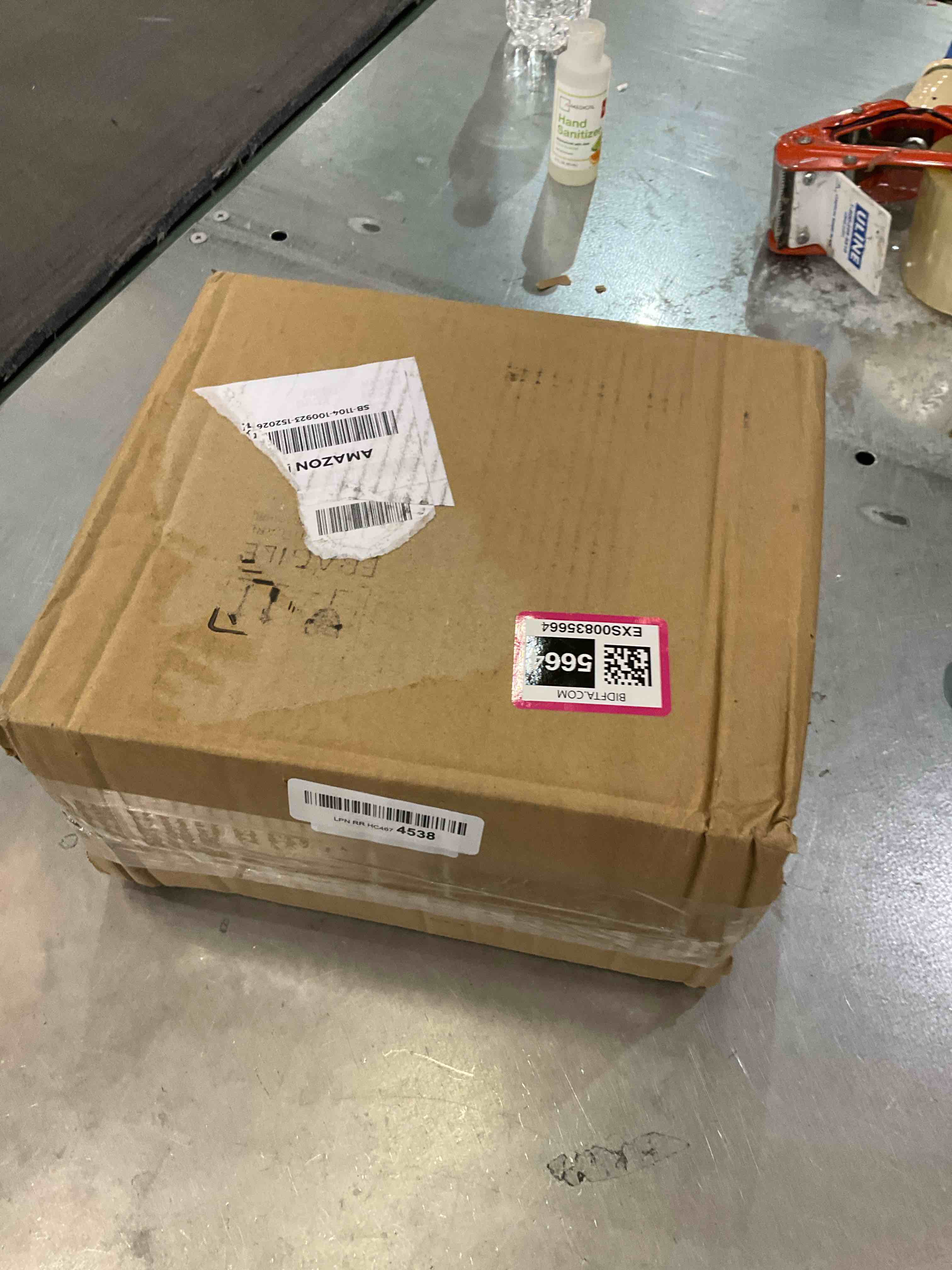 https://s3.amazonaws.com/lotting-images-prod/bidfta/EXS00835664_1699285428614.jpeg