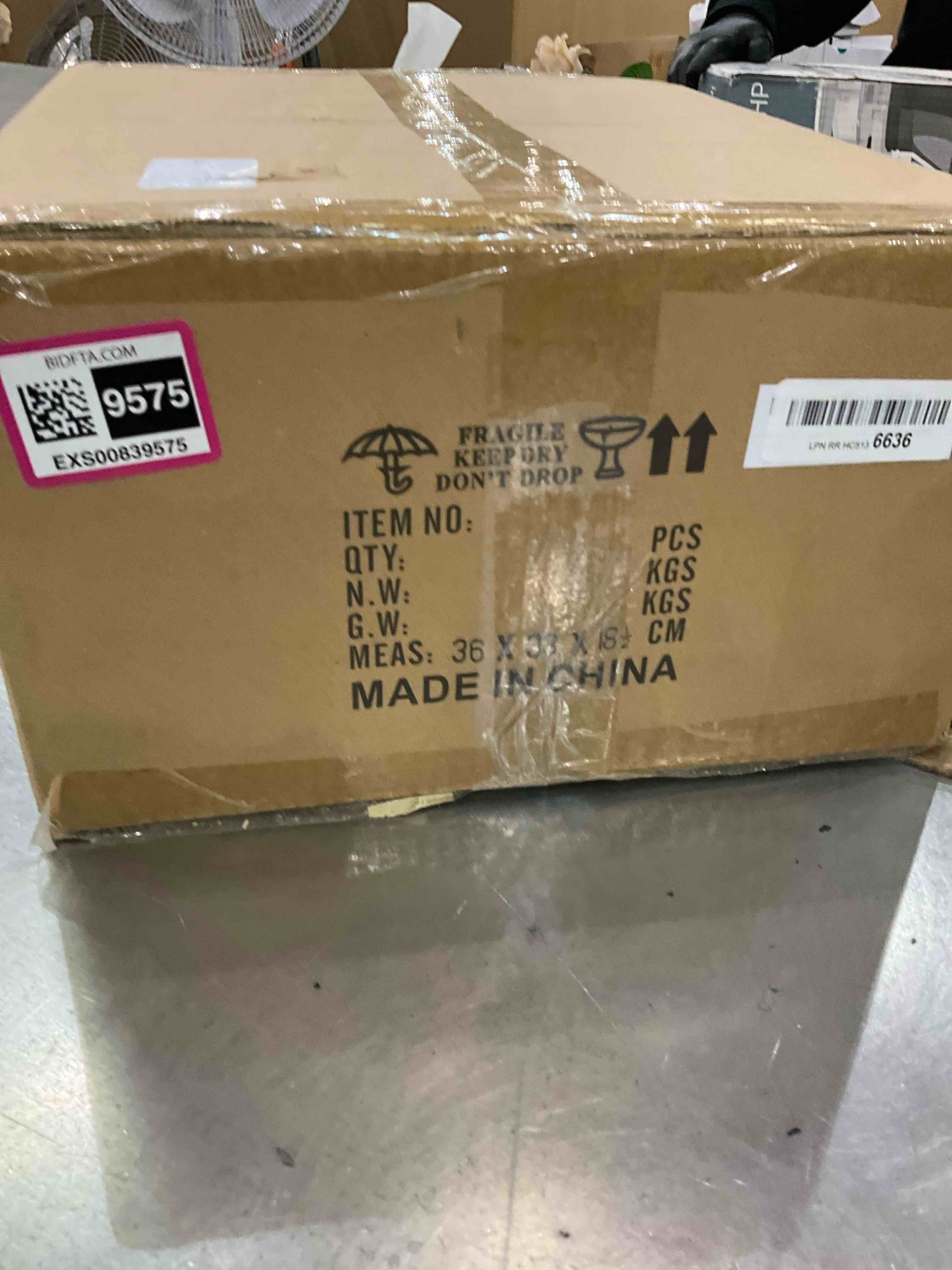 https://s3.amazonaws.com/lotting-images-prod/bidfta/EXS00839575_1699023468770.jpeg