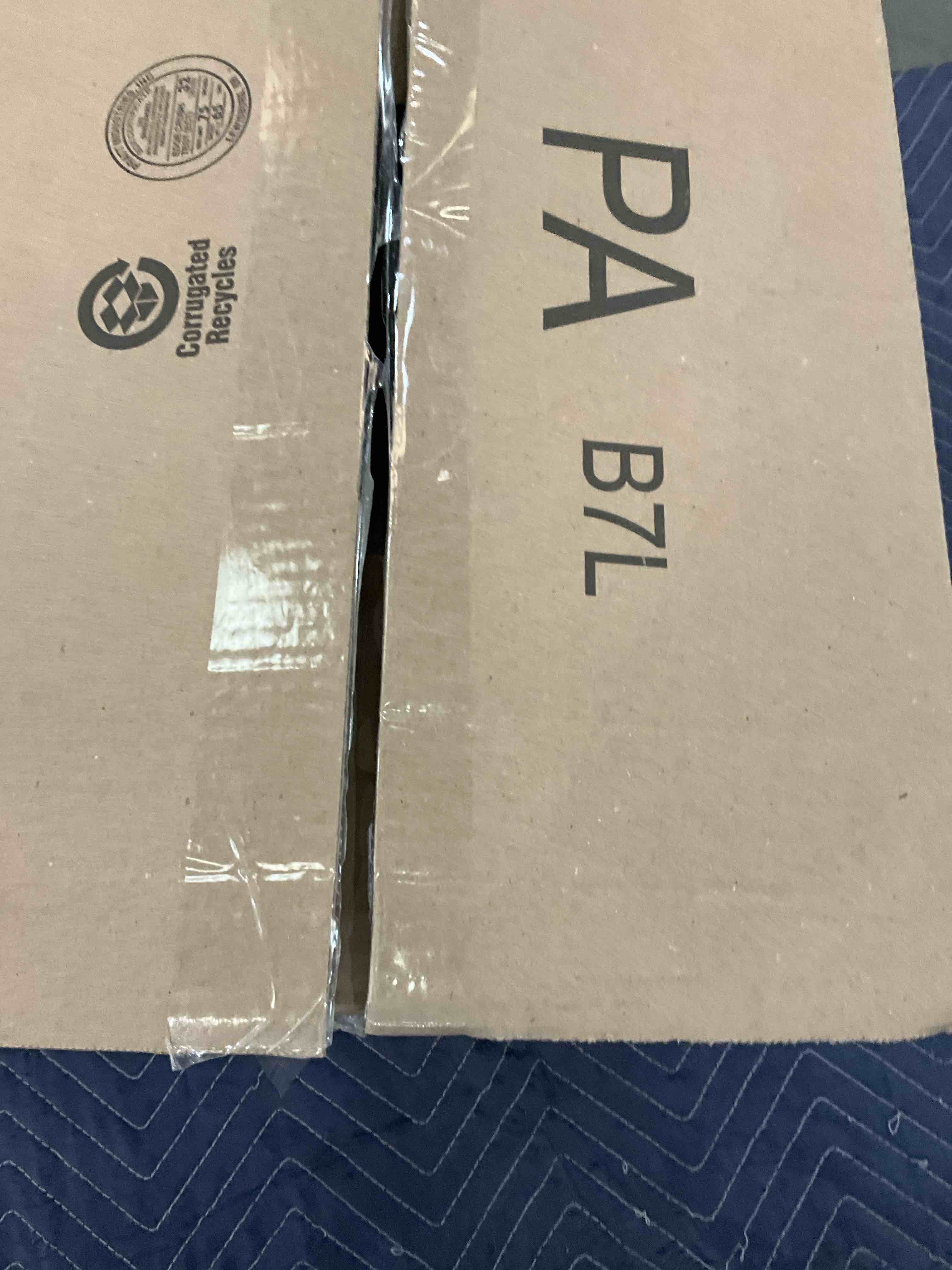 https://s3.amazonaws.com/lotting-images-prod/bidfta/EXS00845505_1701973521574.jpeg