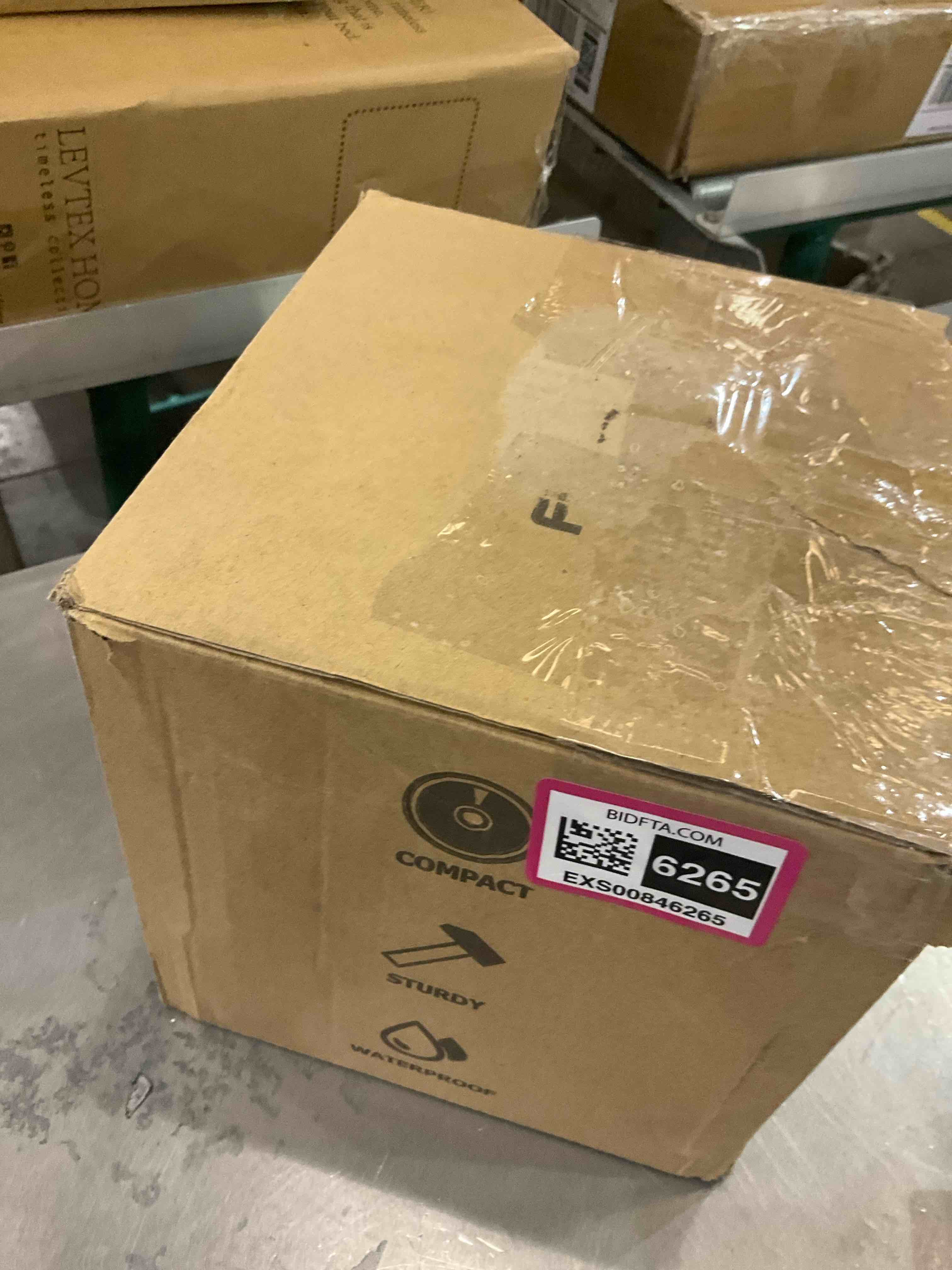 https://s3.amazonaws.com/lotting-images-prod/bidfta/EXS00846265_1704912250324.jpeg