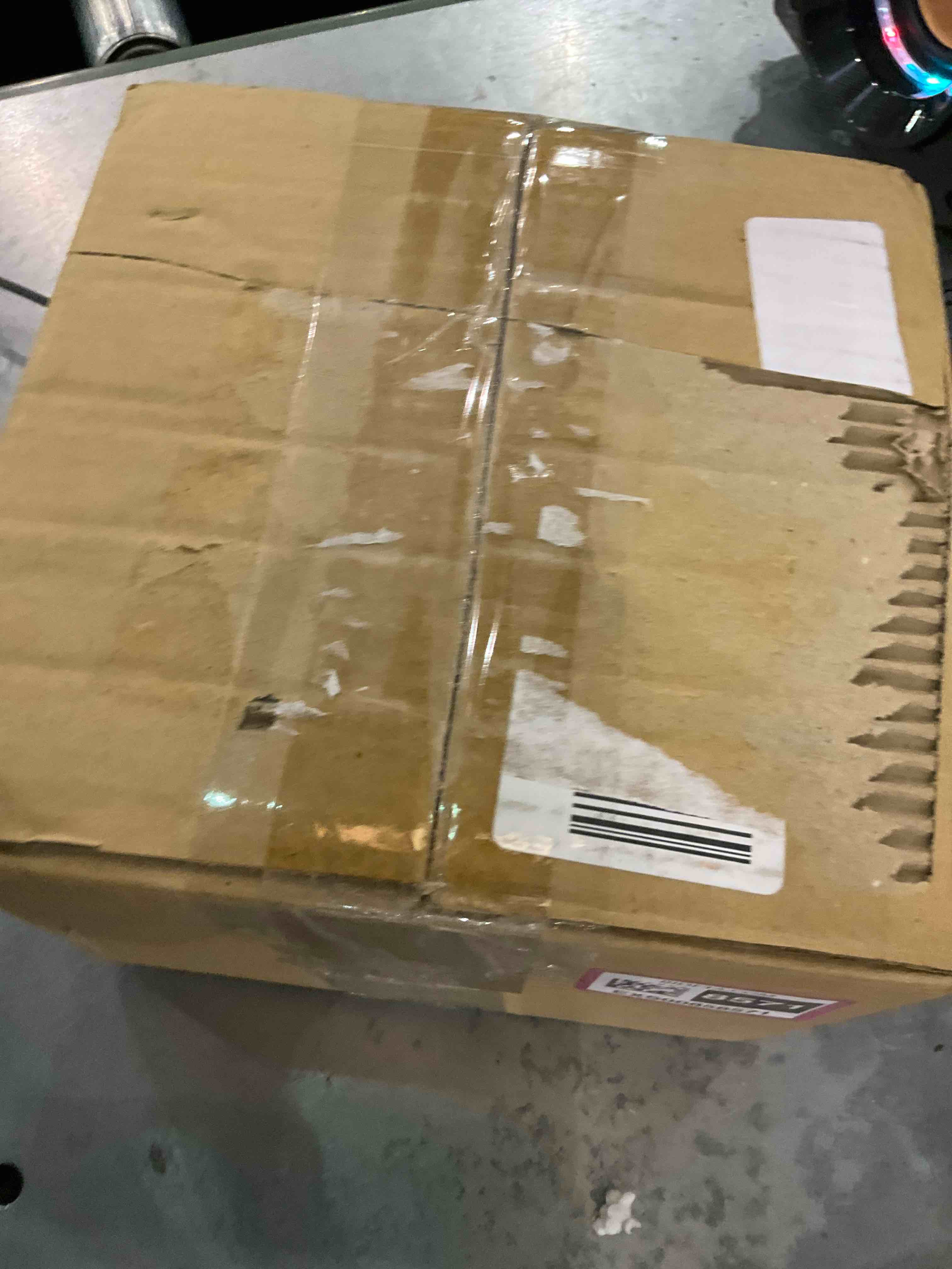 https://s3.amazonaws.com/lotting-images-prod/bidfta/EXS00858571_1704296729621.jpeg