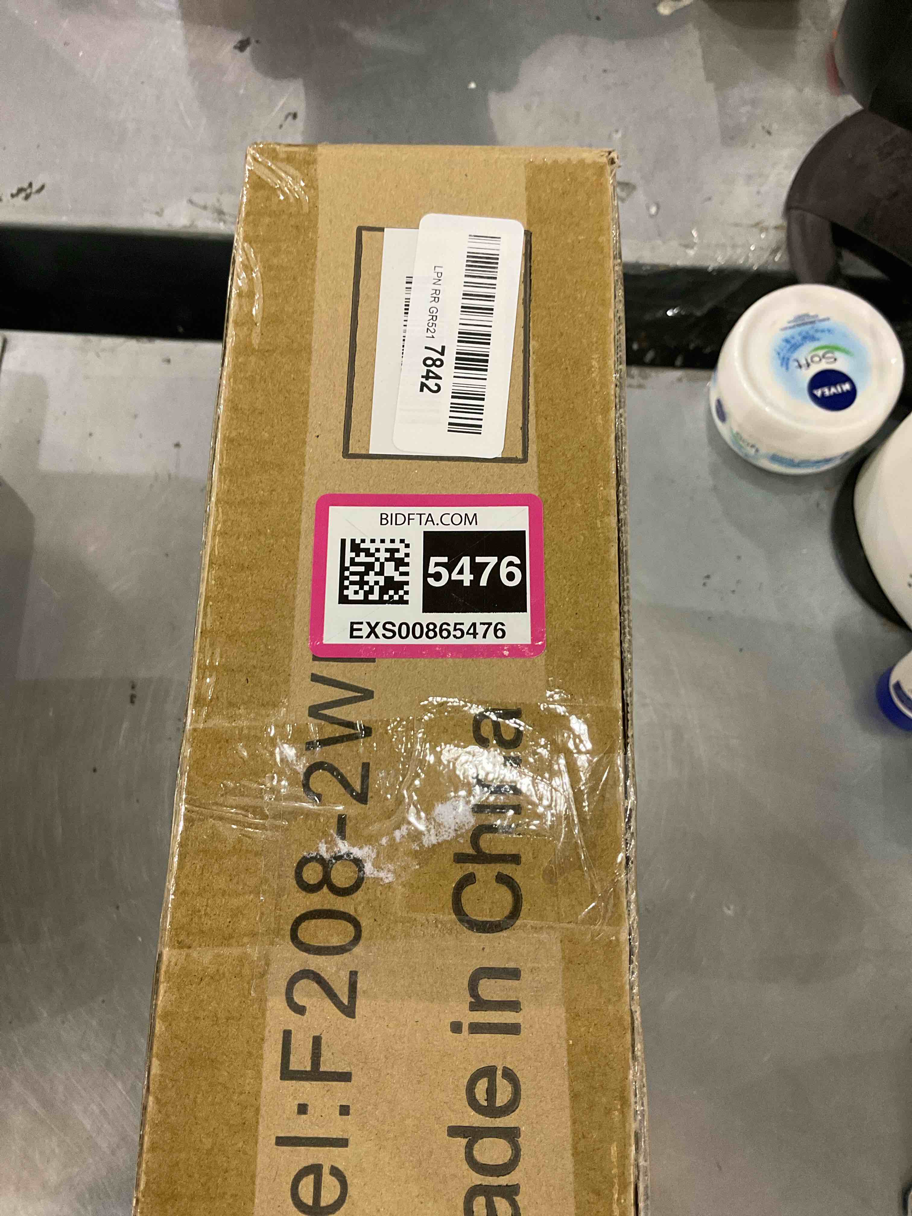 https://s3.amazonaws.com/lotting-images-prod/bidfta/EXS00865476_1699624300971.jpeg