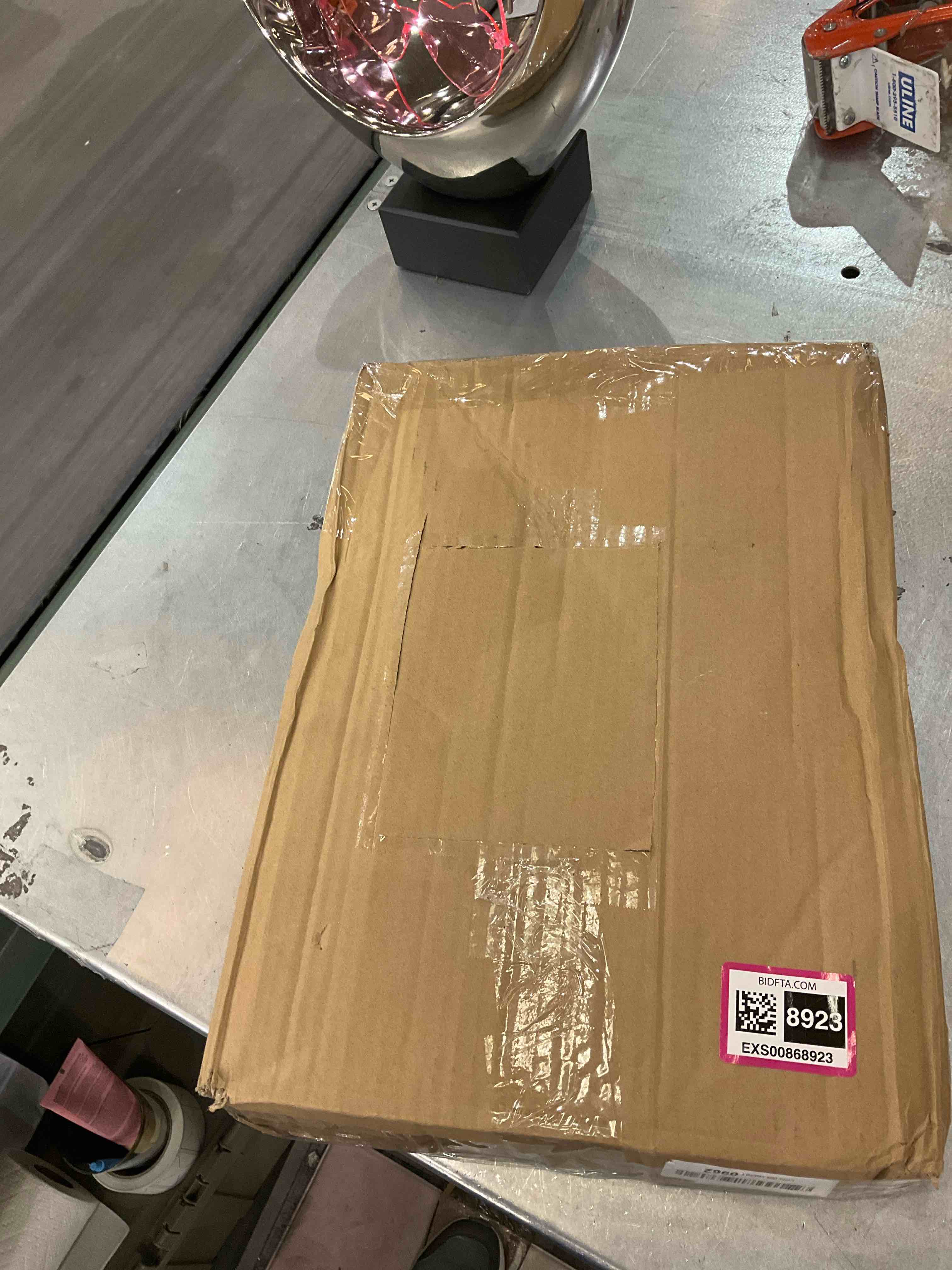 https://s3.amazonaws.com/lotting-images-prod/bidfta/EXS00868923_1700063718035.jpeg