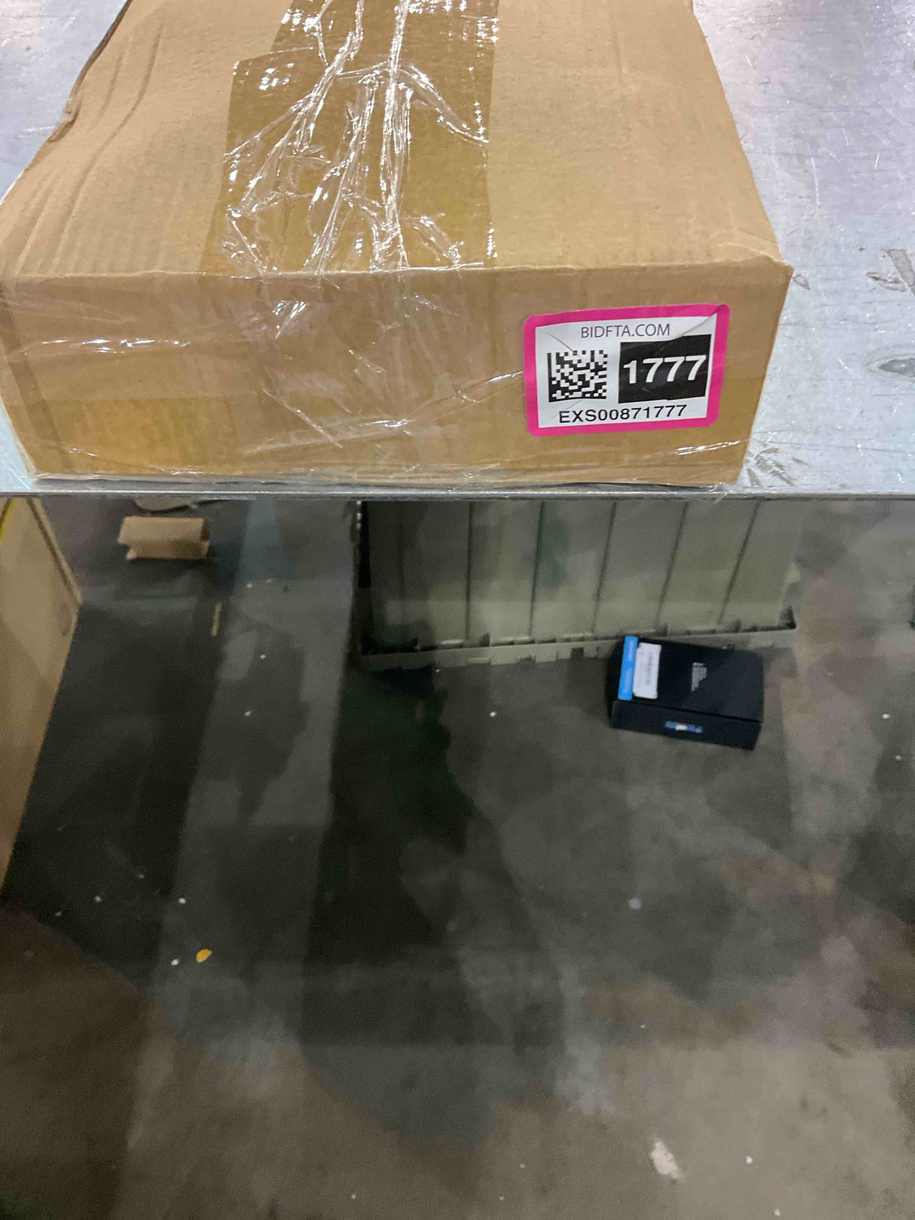 https://s3.amazonaws.com/lotting-images-prod/bidfta/EXS00871777_1698925761077.jpeg