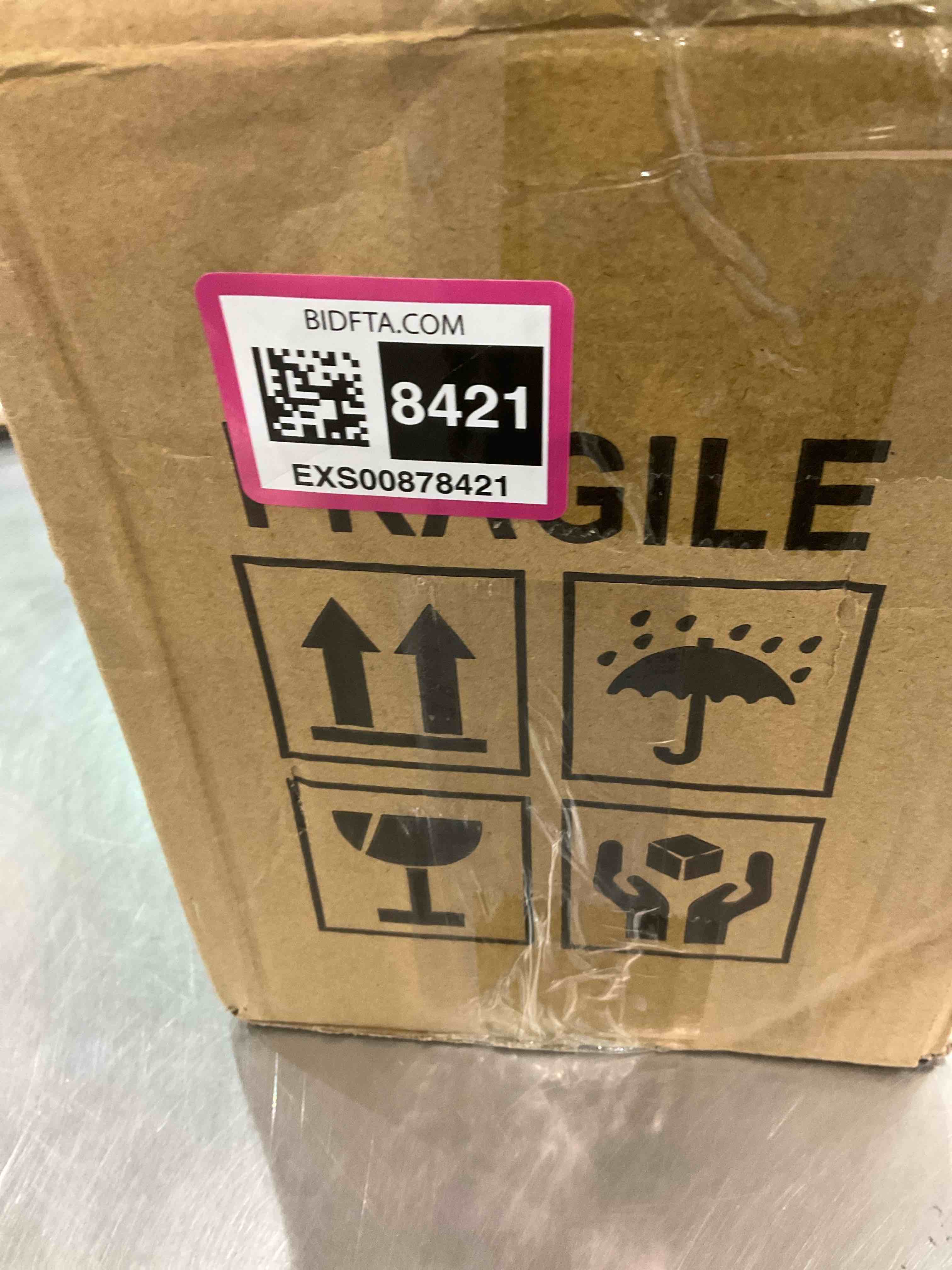 https://s3.amazonaws.com/lotting-images-prod/bidfta/EXS00878421_1699368063717.jpeg