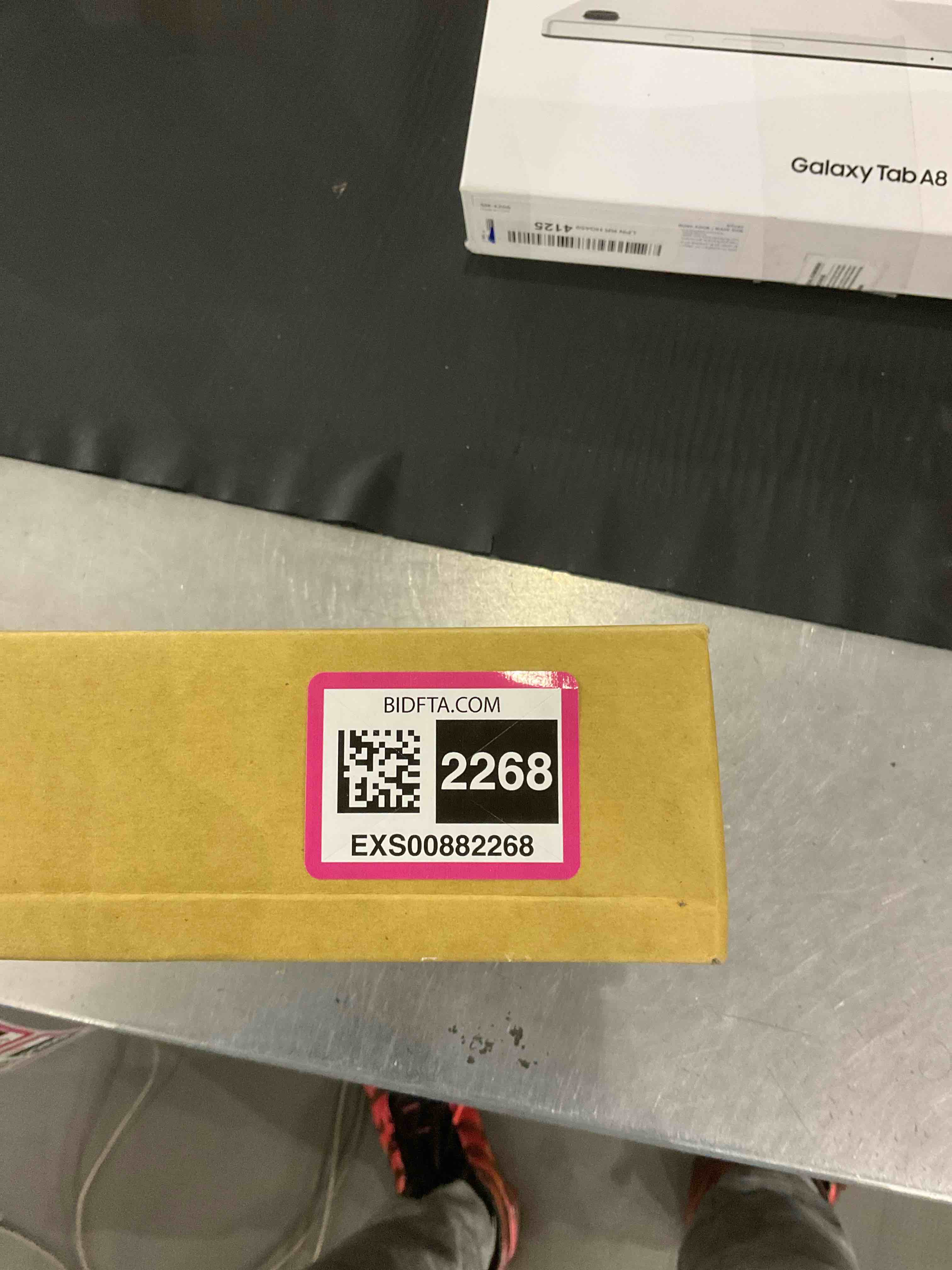 https://s3.amazonaws.com/lotting-images-prod/bidfta/EXS00882268_1702469603092.jpeg