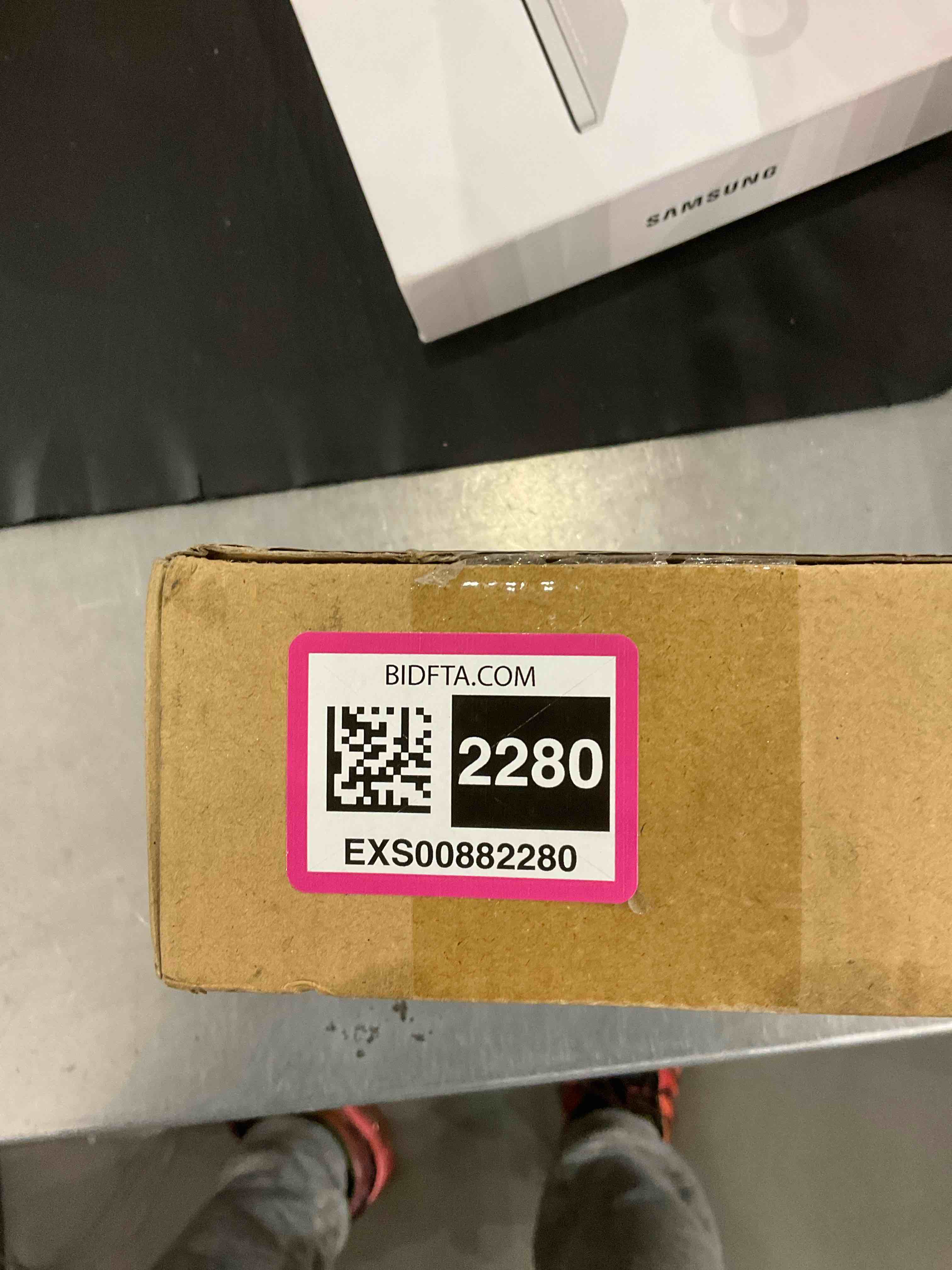 https://s3.amazonaws.com/lotting-images-prod/bidfta/EXS00882280_1702471248659.jpeg