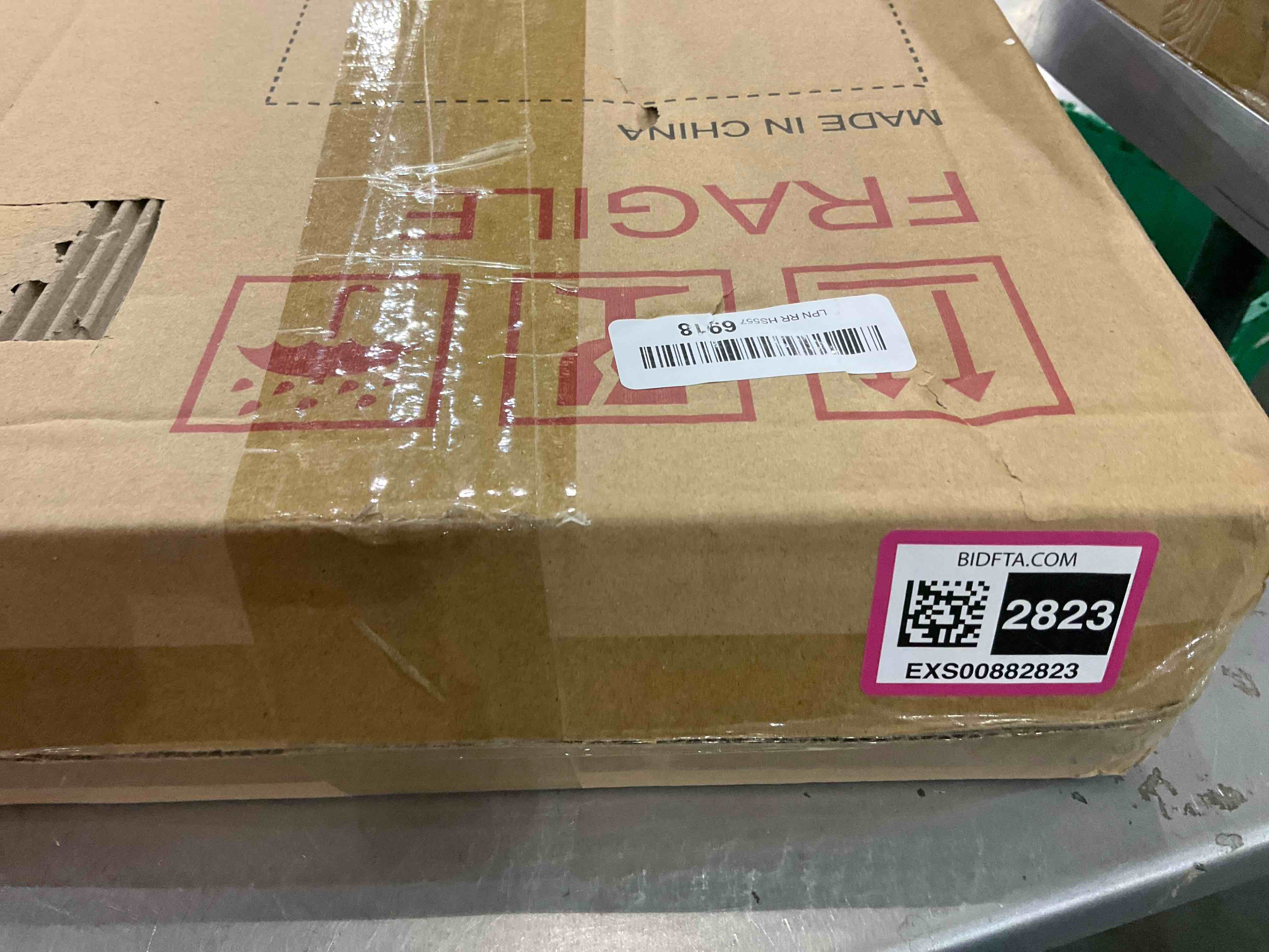 https://s3.amazonaws.com/lotting-images-prod/bidfta/EXS00882823_1702042053054.jpeg