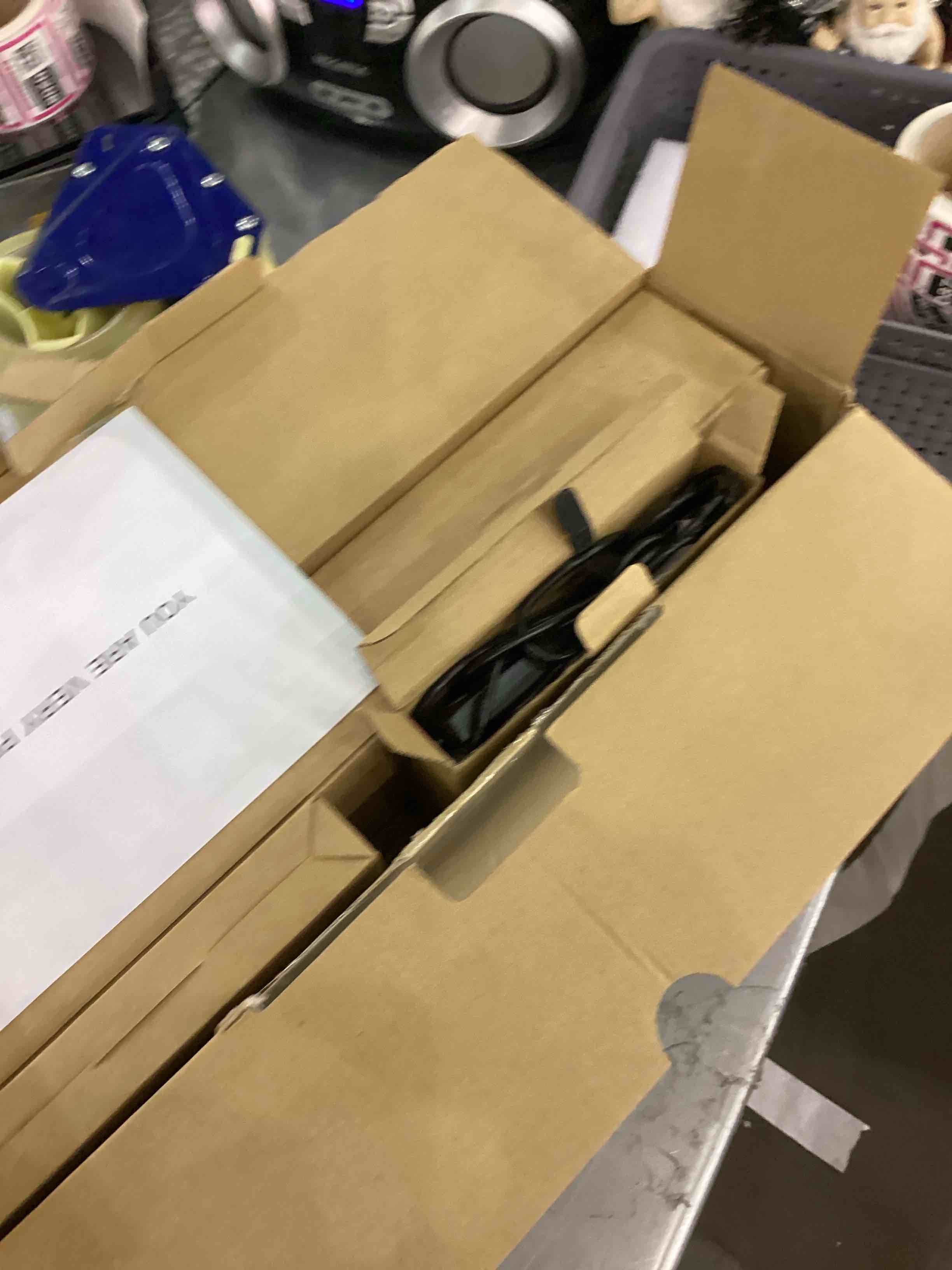 https://s3.amazonaws.com/lotting-images-prod/bidfta/EXS00885073_1700659194468.jpeg