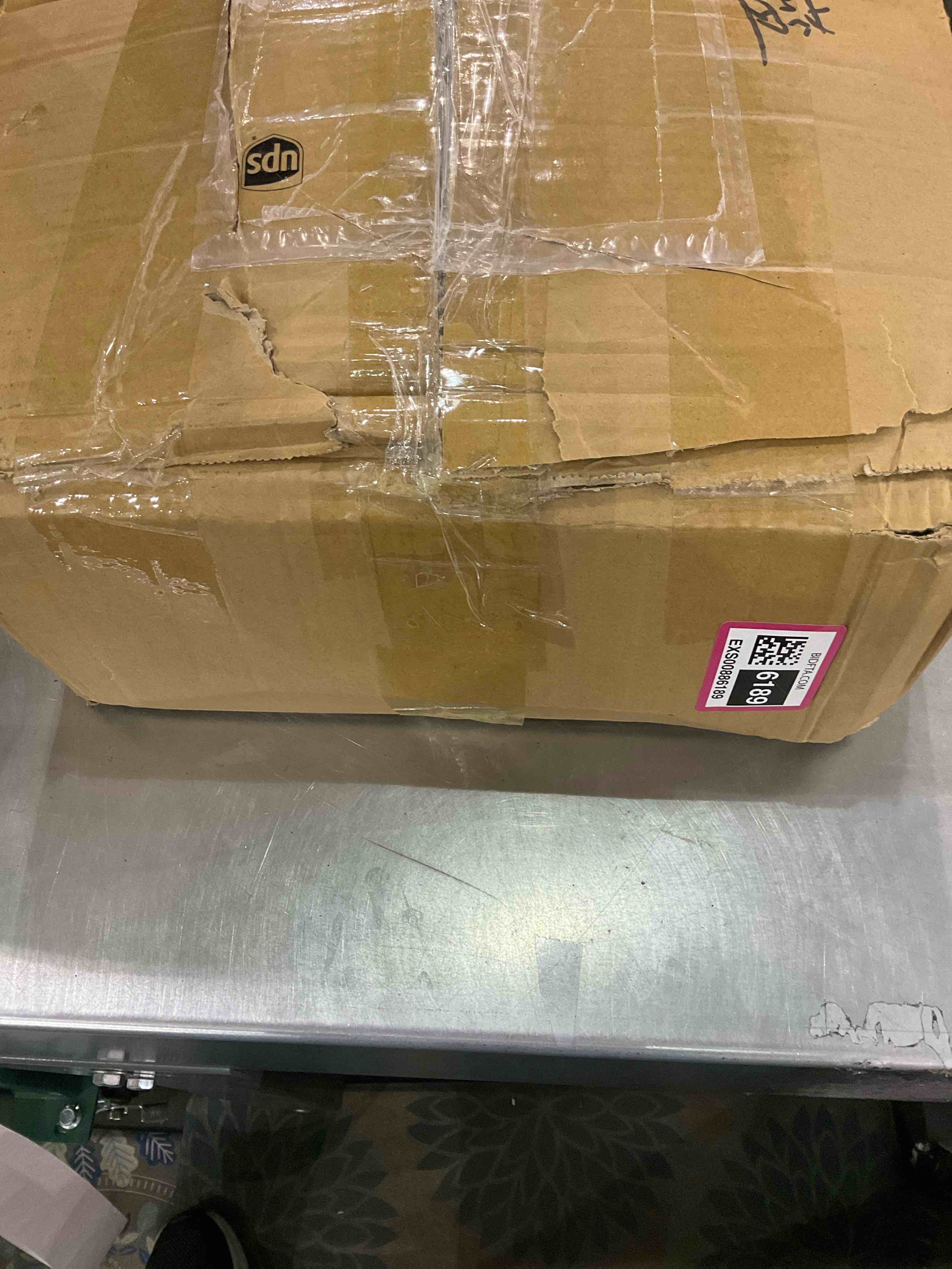 https://s3.amazonaws.com/lotting-images-prod/bidfta/EXS00886189_1700485574737.jpeg