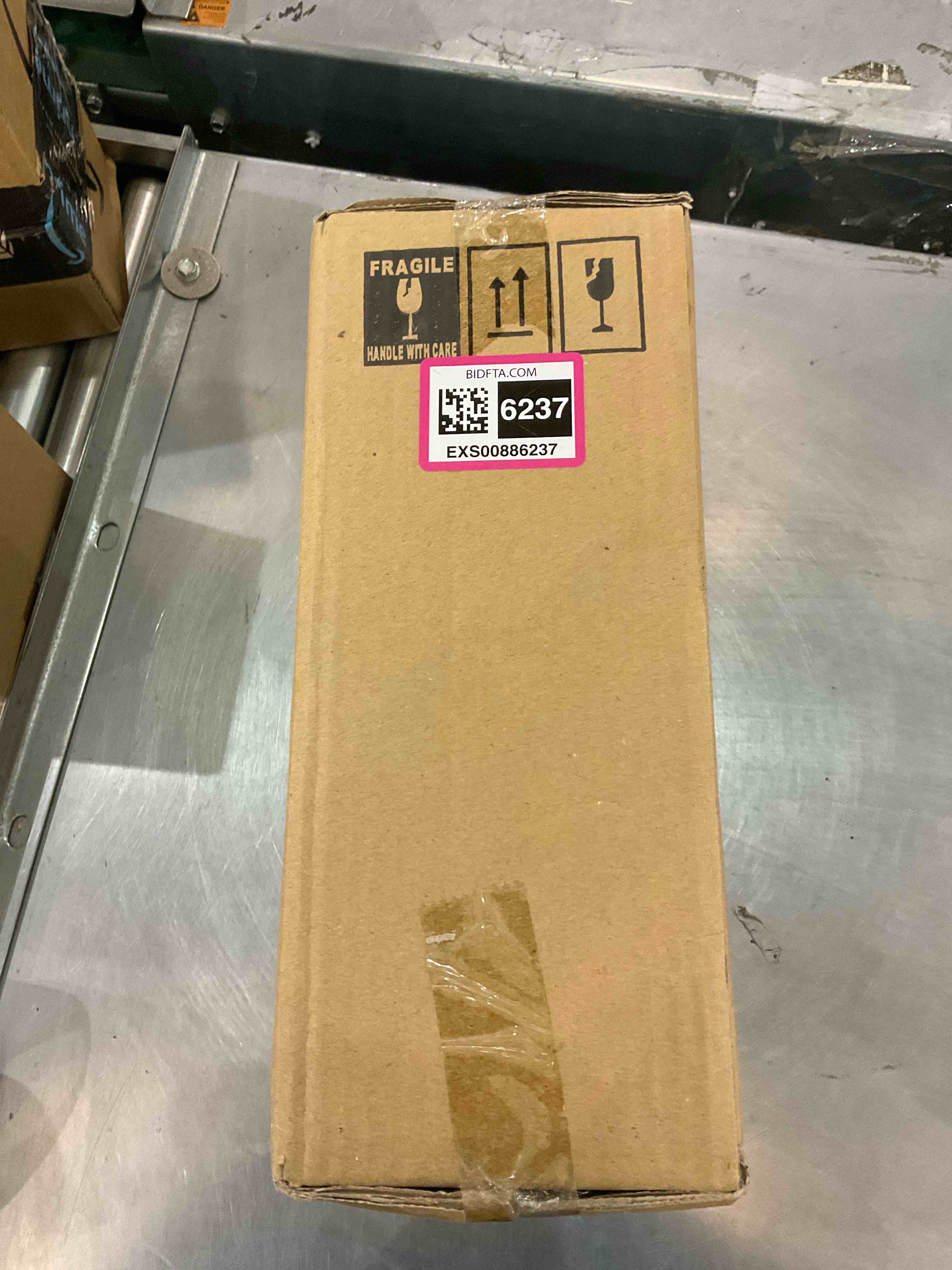 https://s3.amazonaws.com/lotting-images-prod/bidfta/EXS00886237_1700492704352.jpeg