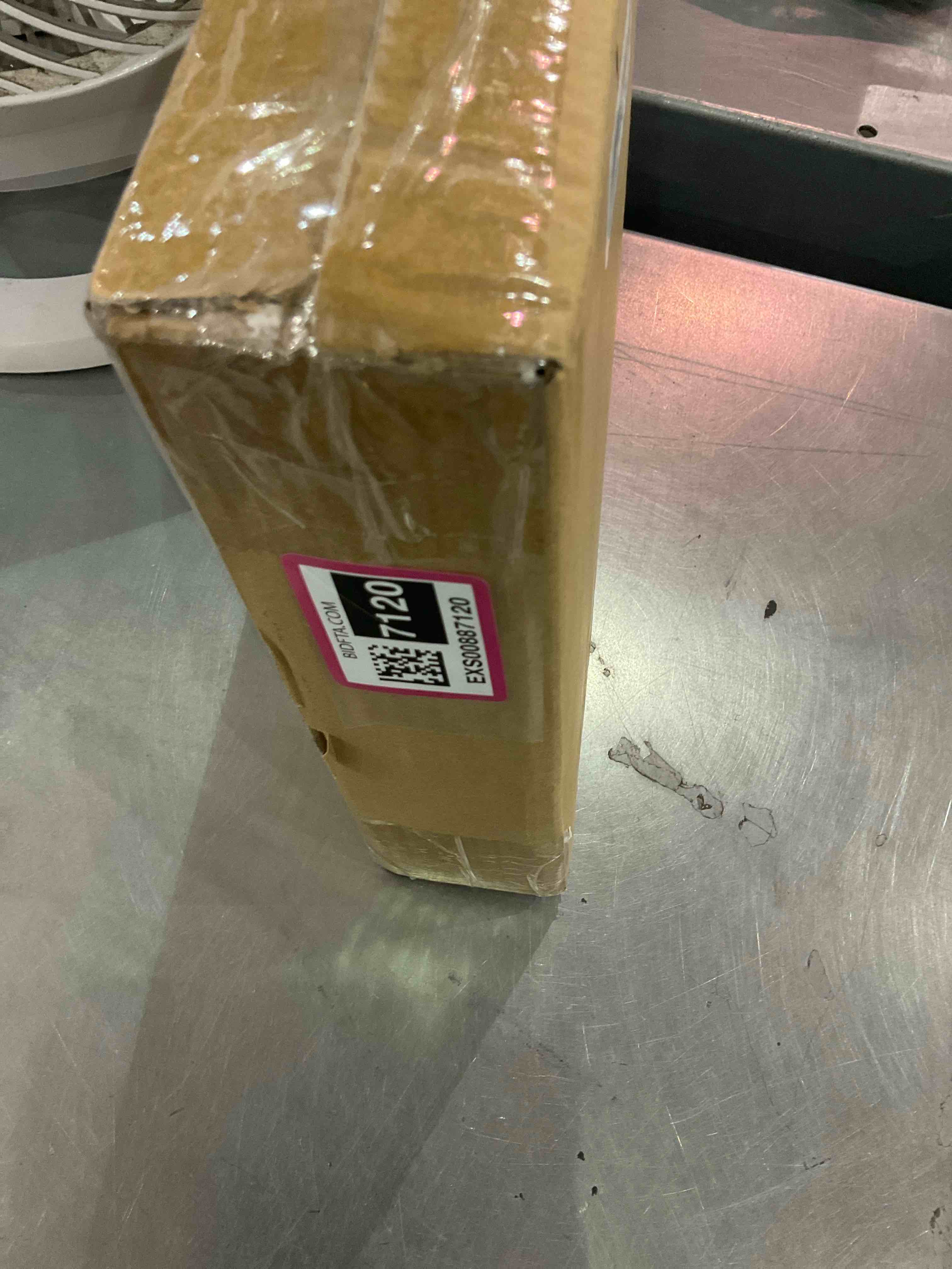 https://s3.amazonaws.com/lotting-images-prod/bidfta/EXS00887120_1700594912166.jpeg