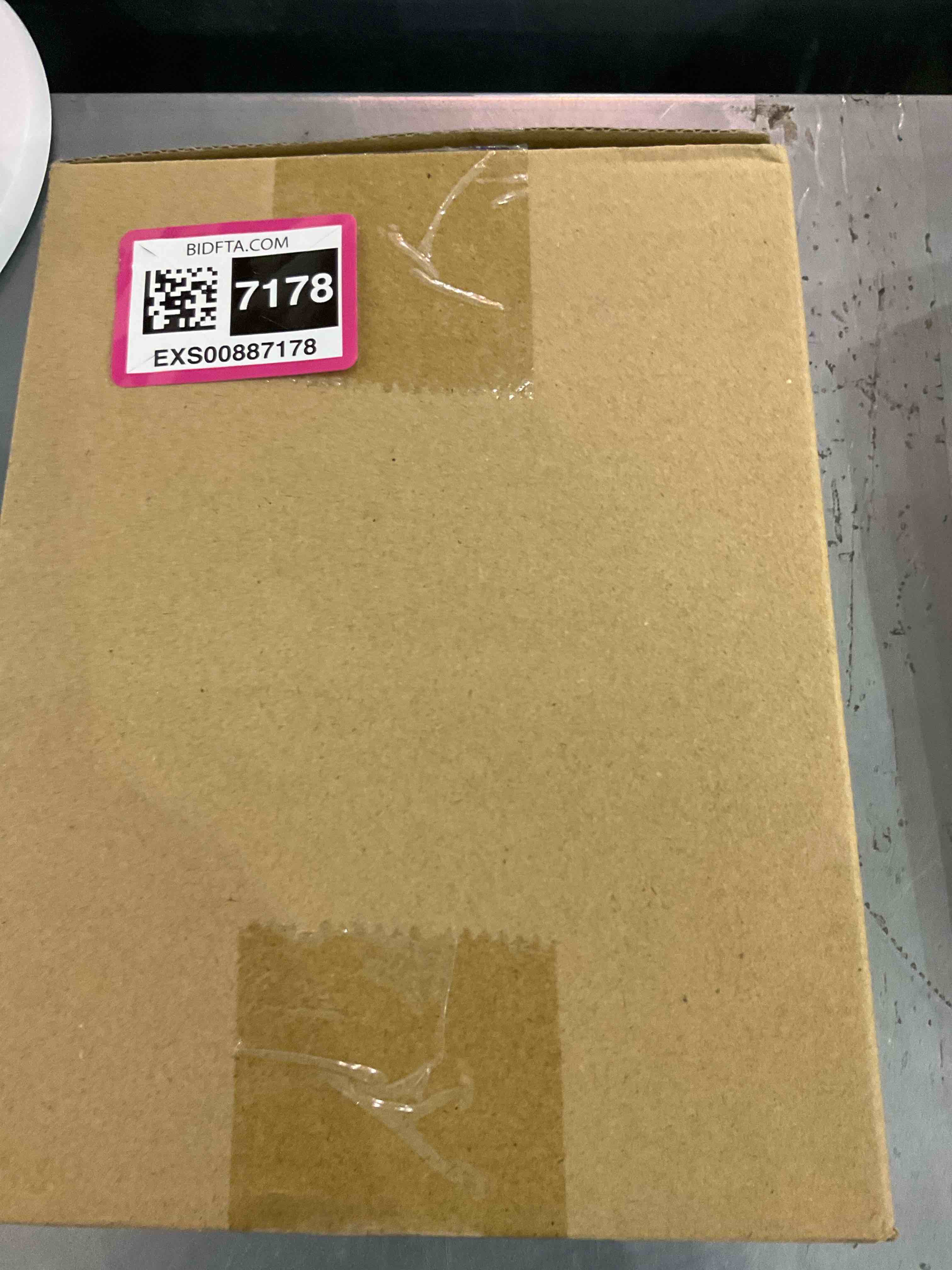 https://s3.amazonaws.com/lotting-images-prod/bidfta/EXS00887178_1700657895869.jpeg