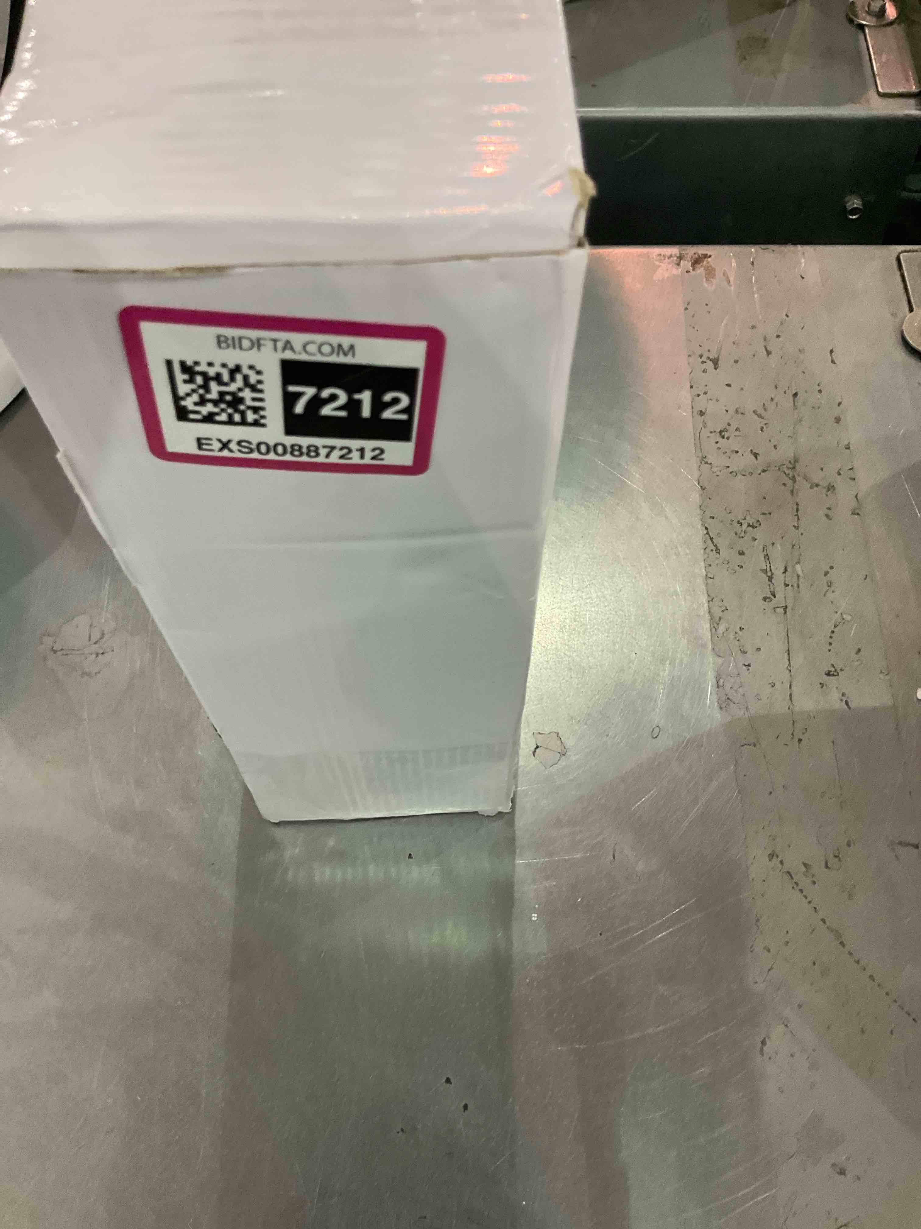 https://s3.amazonaws.com/lotting-images-prod/bidfta/EXS00887212_1700665362871.jpeg
