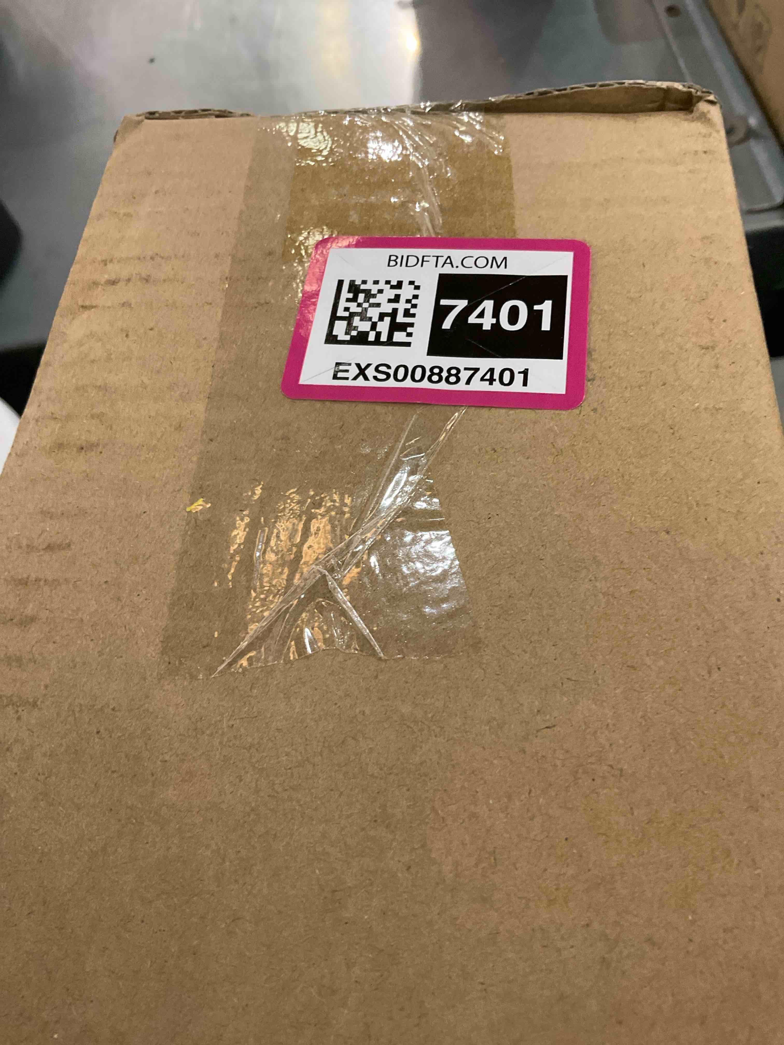 https://s3.amazonaws.com/lotting-images-prod/bidfta/EXS00887401_1701104132387.jpeg