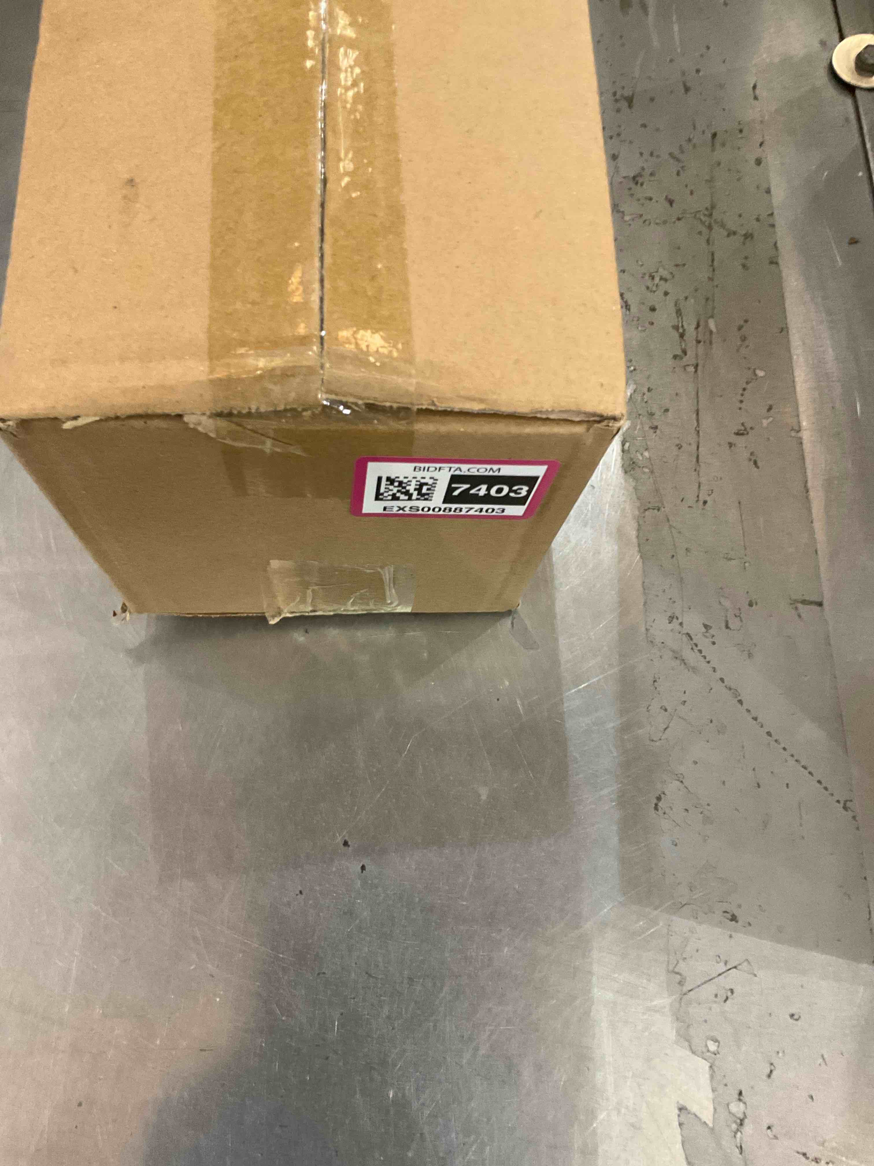 https://s3.amazonaws.com/lotting-images-prod/bidfta/EXS00887403_1701106769073.jpeg