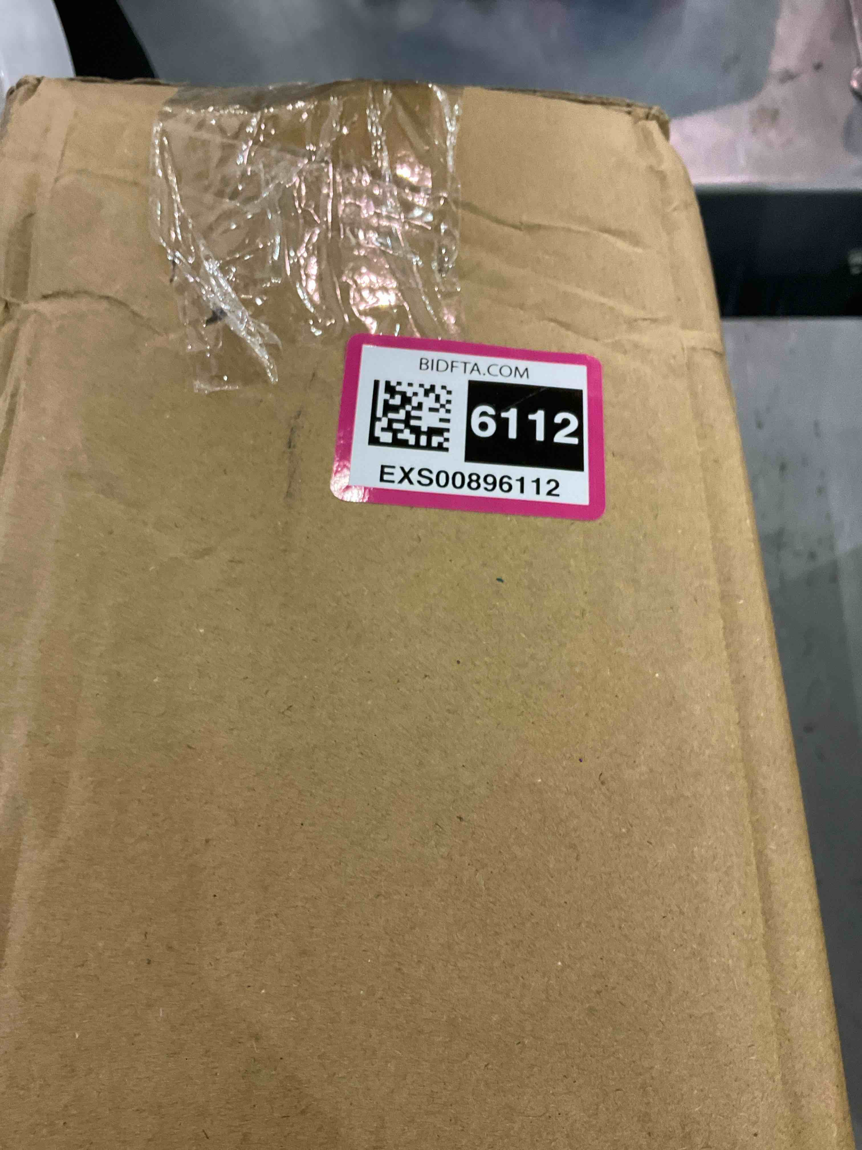 https://s3.amazonaws.com/lotting-images-prod/bidfta/EXS00896112_1699881356302.jpeg