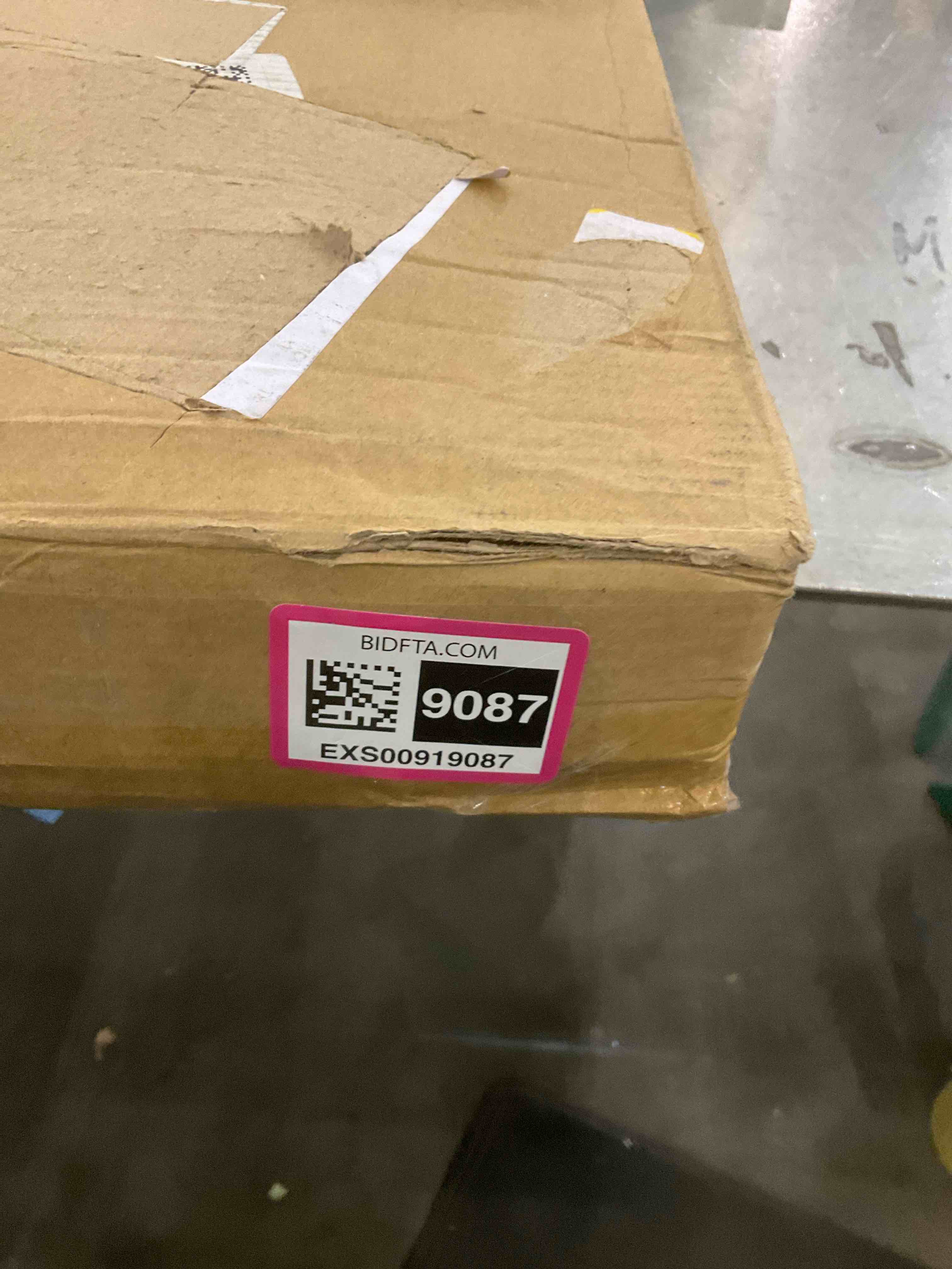 https://s3.amazonaws.com/lotting-images-prod/bidfta/EXS00919087_1701272369574.jpeg