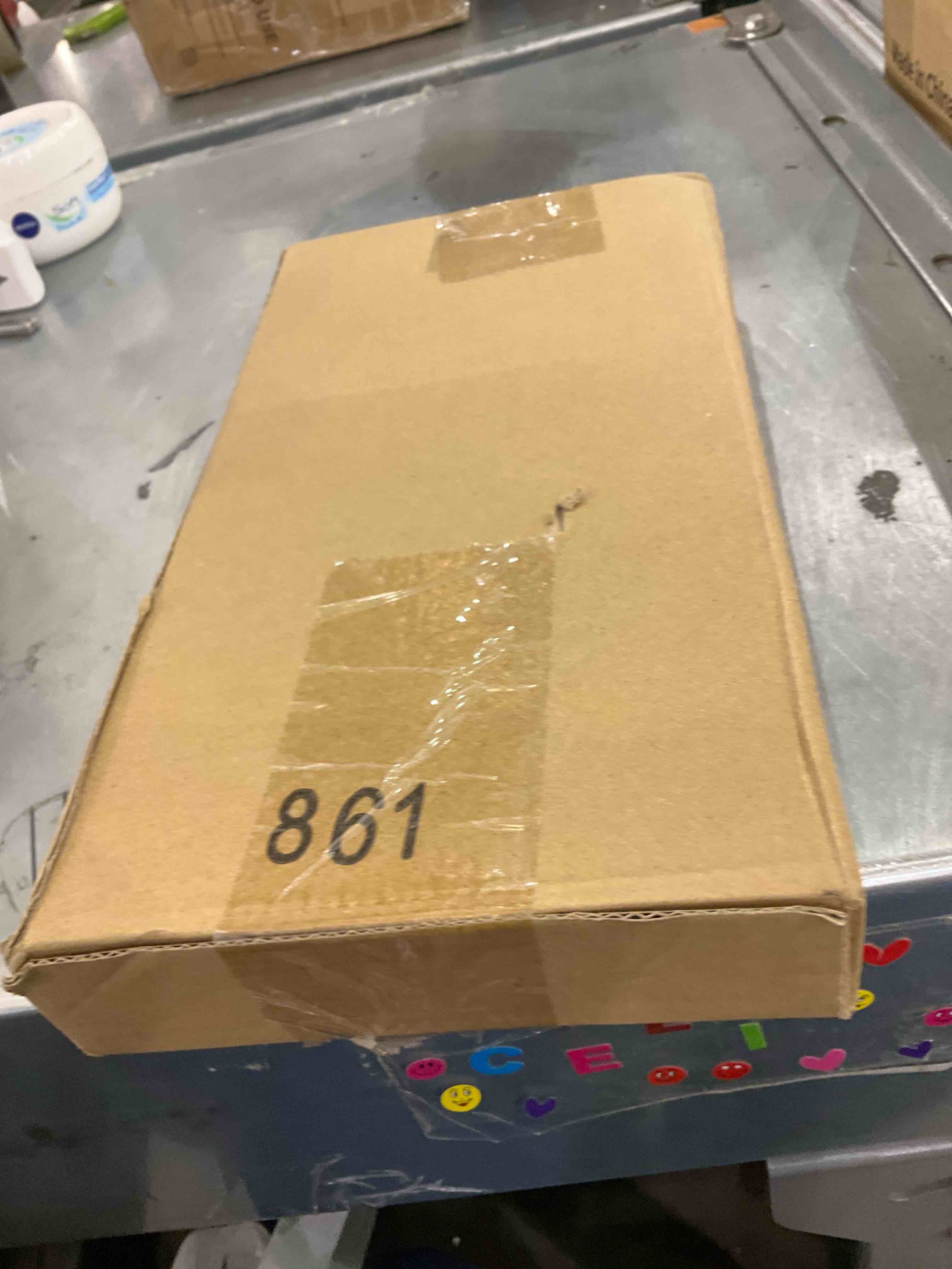 https://s3.amazonaws.com/lotting-images-prod/bidfta/EXS00921221_1702650776885.jpeg