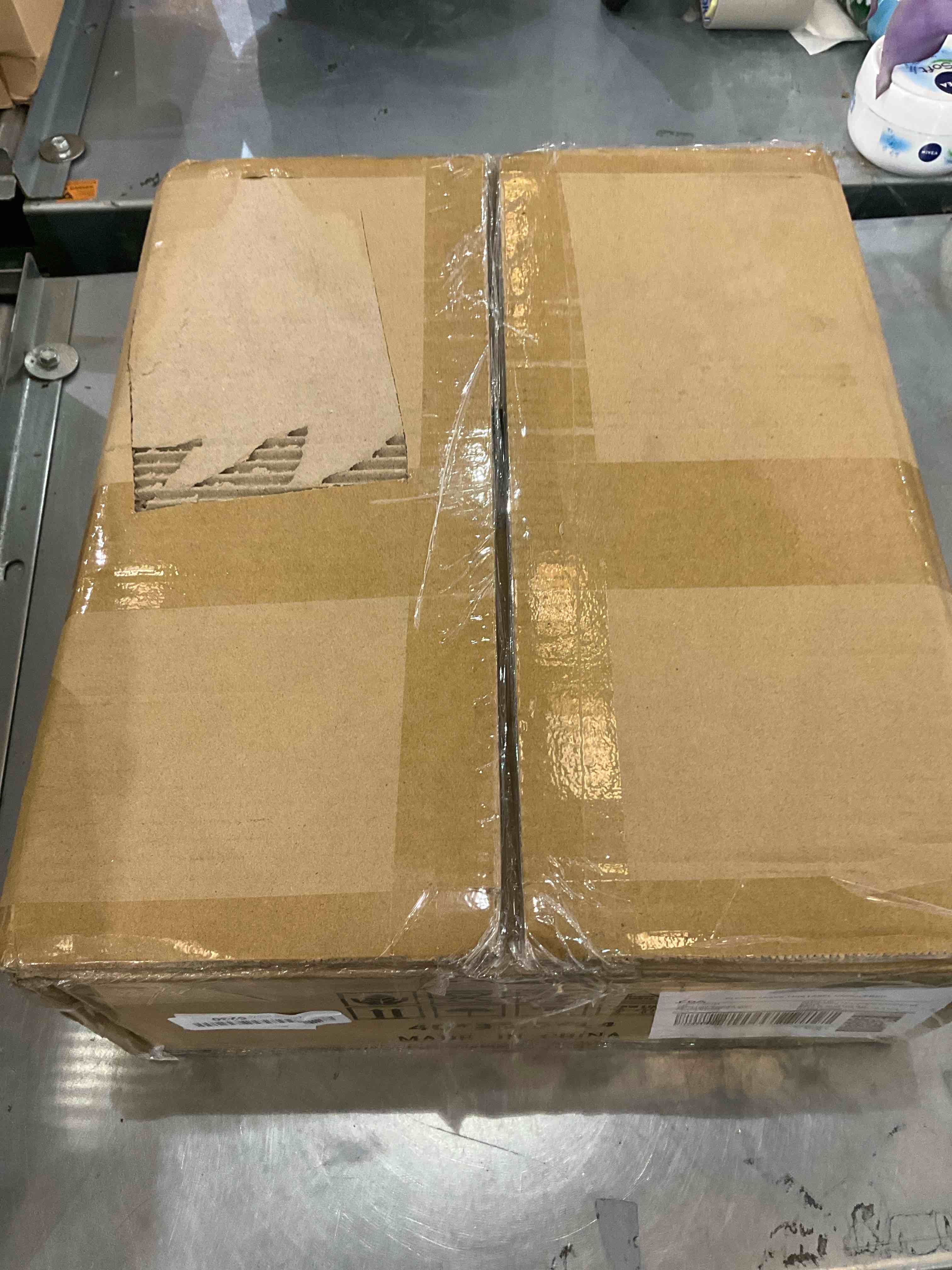 https://s3.amazonaws.com/lotting-images-prod/bidfta/EXS00921808_1704732140861.jpeg