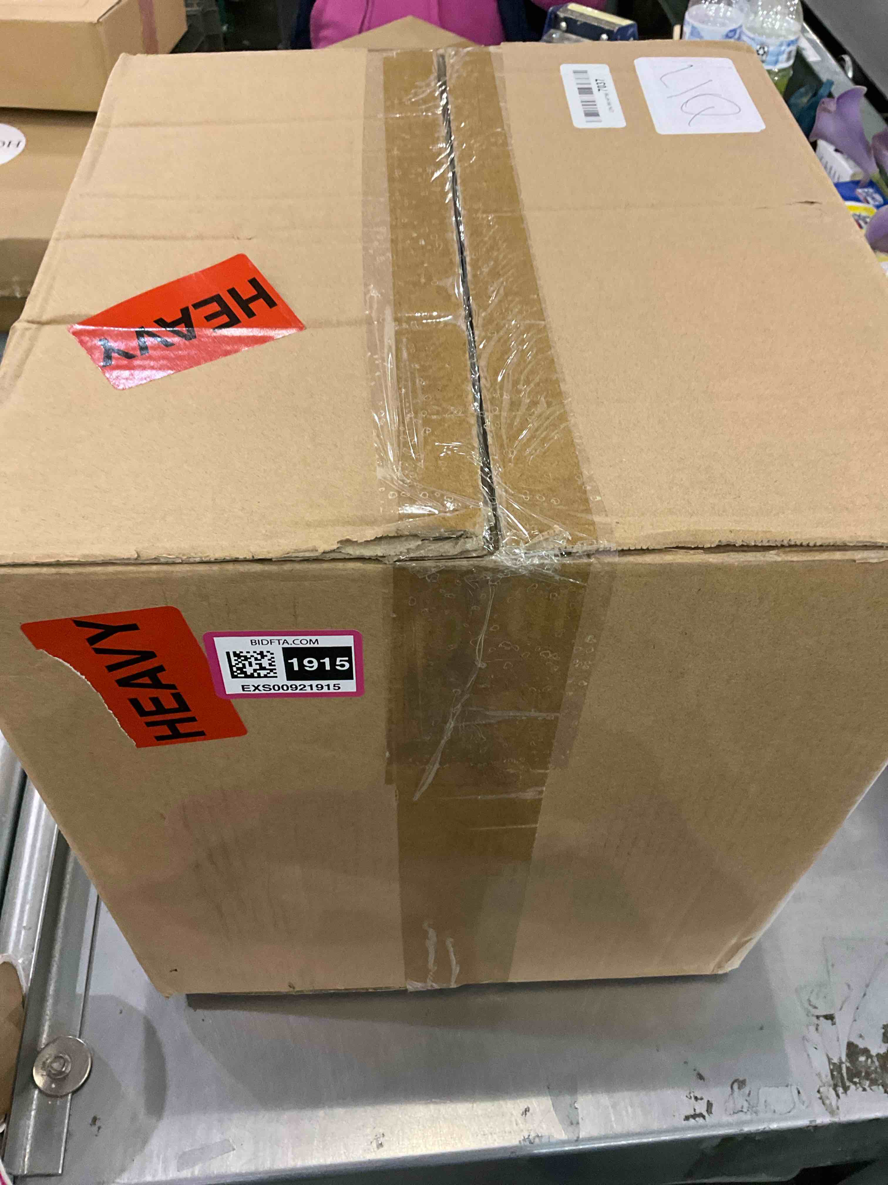 https://s3.amazonaws.com/lotting-images-prod/bidfta/EXS00921915_1704810657756.jpeg