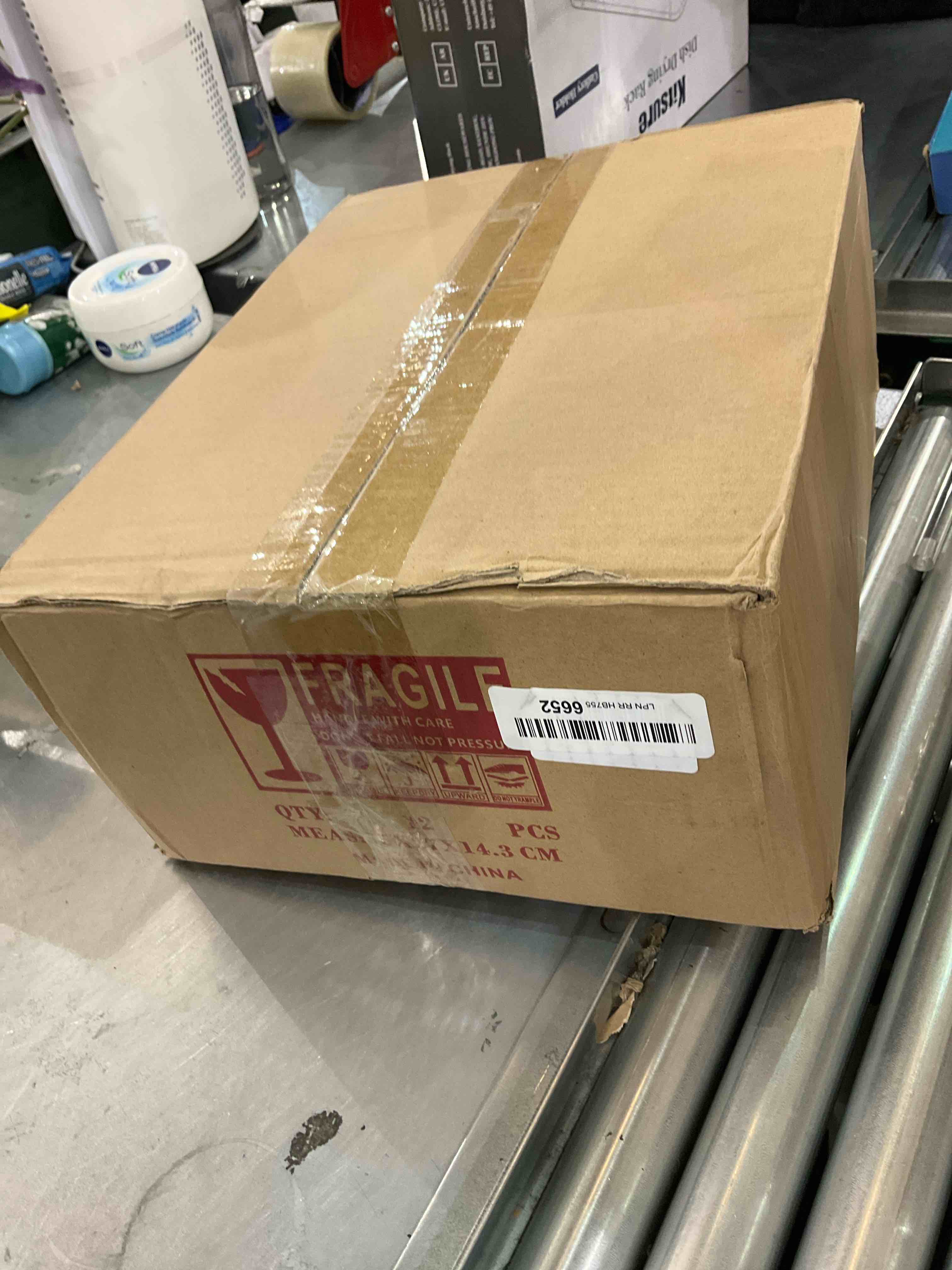 https://s3.amazonaws.com/lotting-images-prod/bidfta/EXS00923946_1701270886090.jpeg