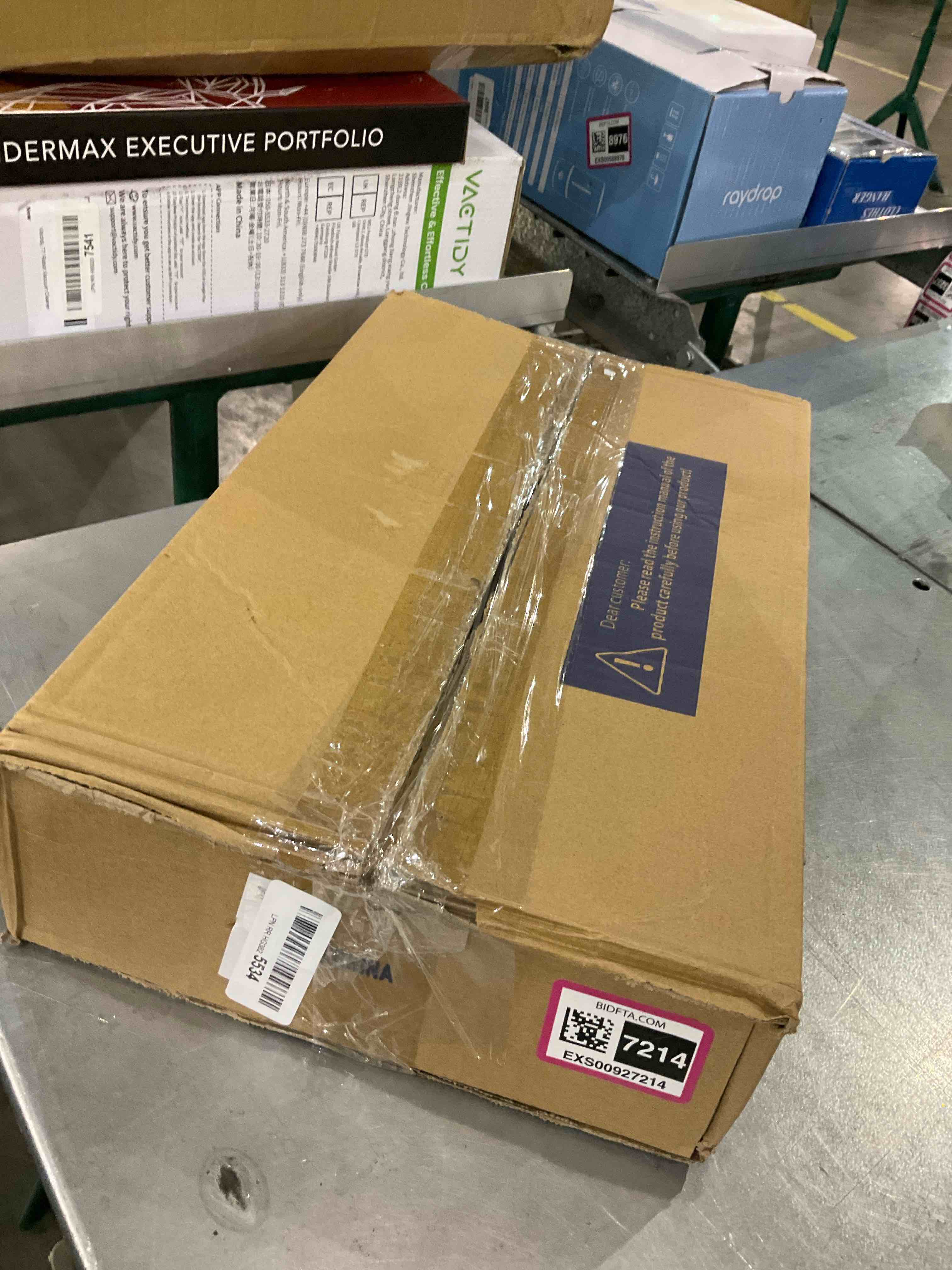 https://s3.amazonaws.com/lotting-images-prod/bidfta/EXS00927214_1702387227657.jpeg