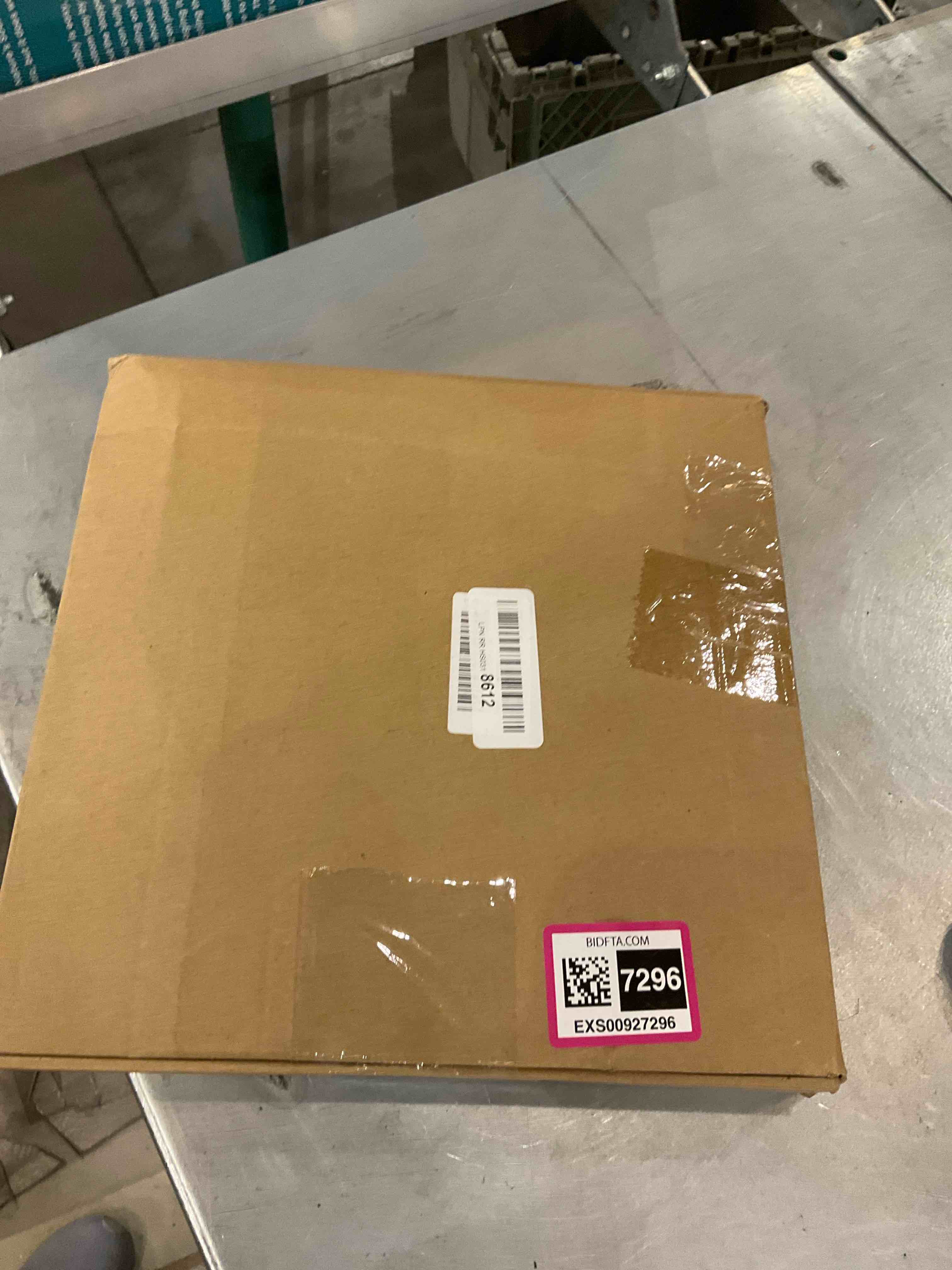 https://s3.amazonaws.com/lotting-images-prod/bidfta/EXS00927296_1702404342845.jpeg
