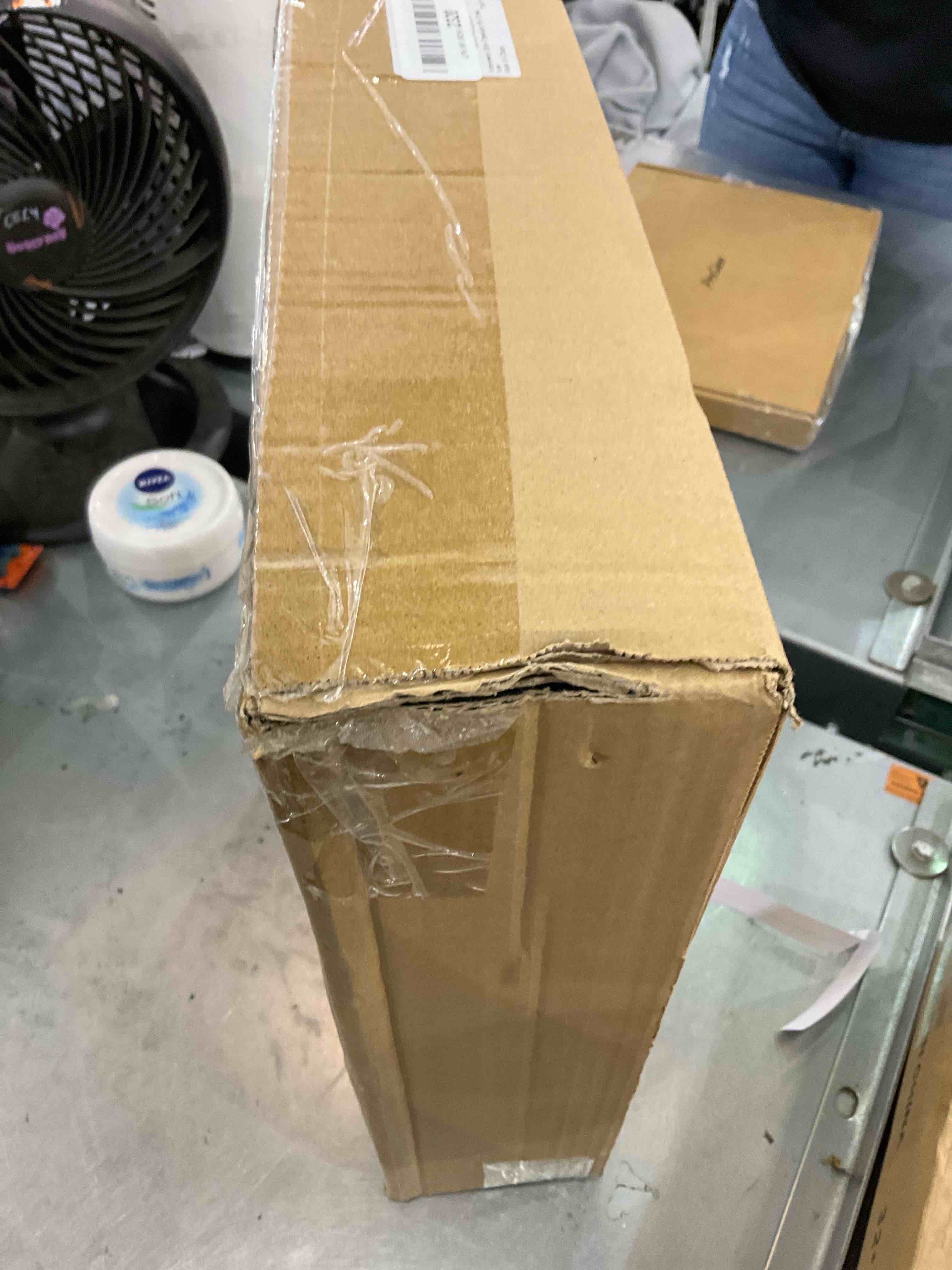 https://s3.amazonaws.com/lotting-images-prod/bidfta/EXS00935967_1699630454476.jpeg