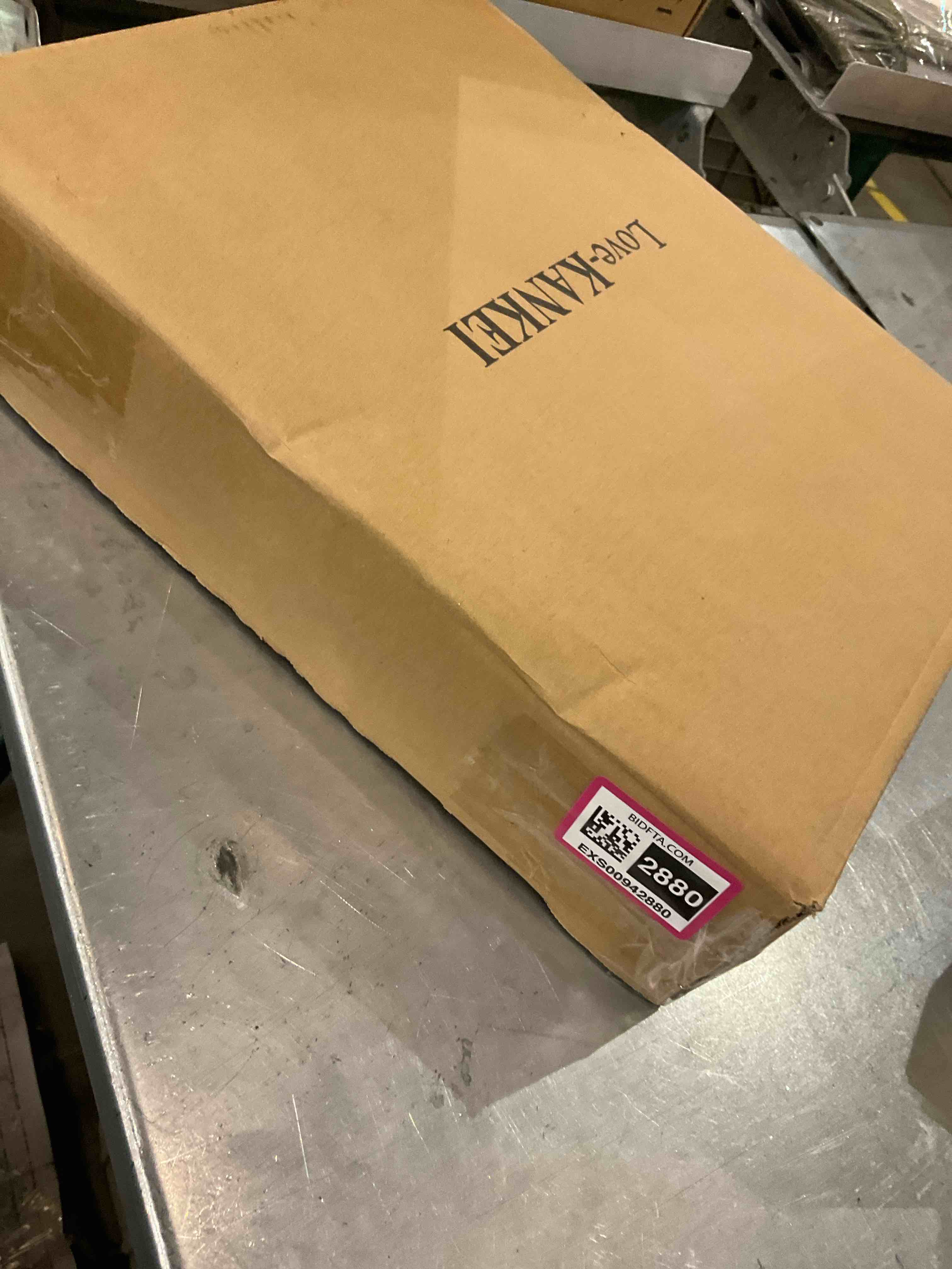 https://s3.amazonaws.com/lotting-images-prod/bidfta/EXS00942880_1703693371314.jpeg