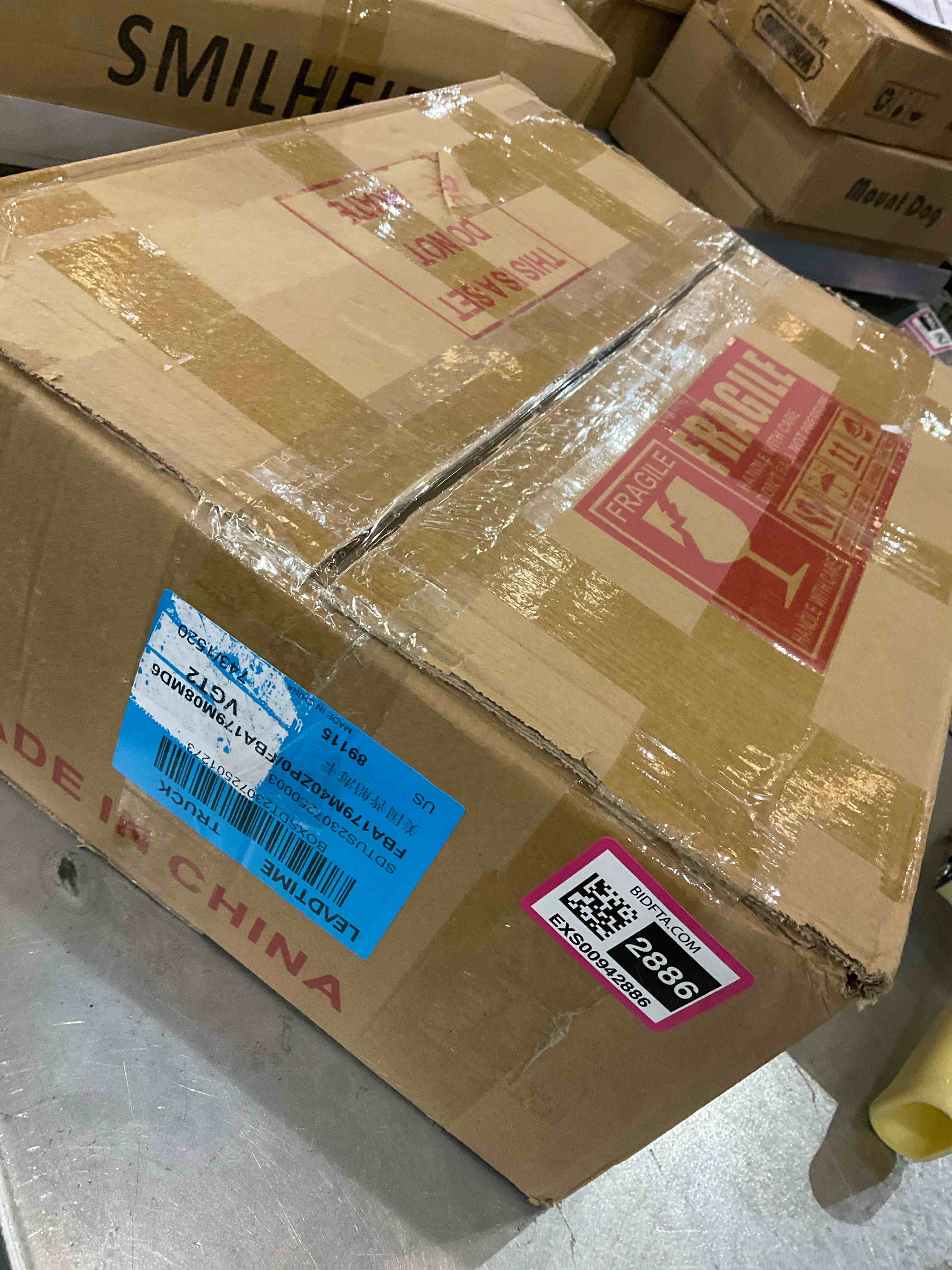 https://s3.amazonaws.com/lotting-images-prod/bidfta/EXS00942886_1703693864856.jpeg