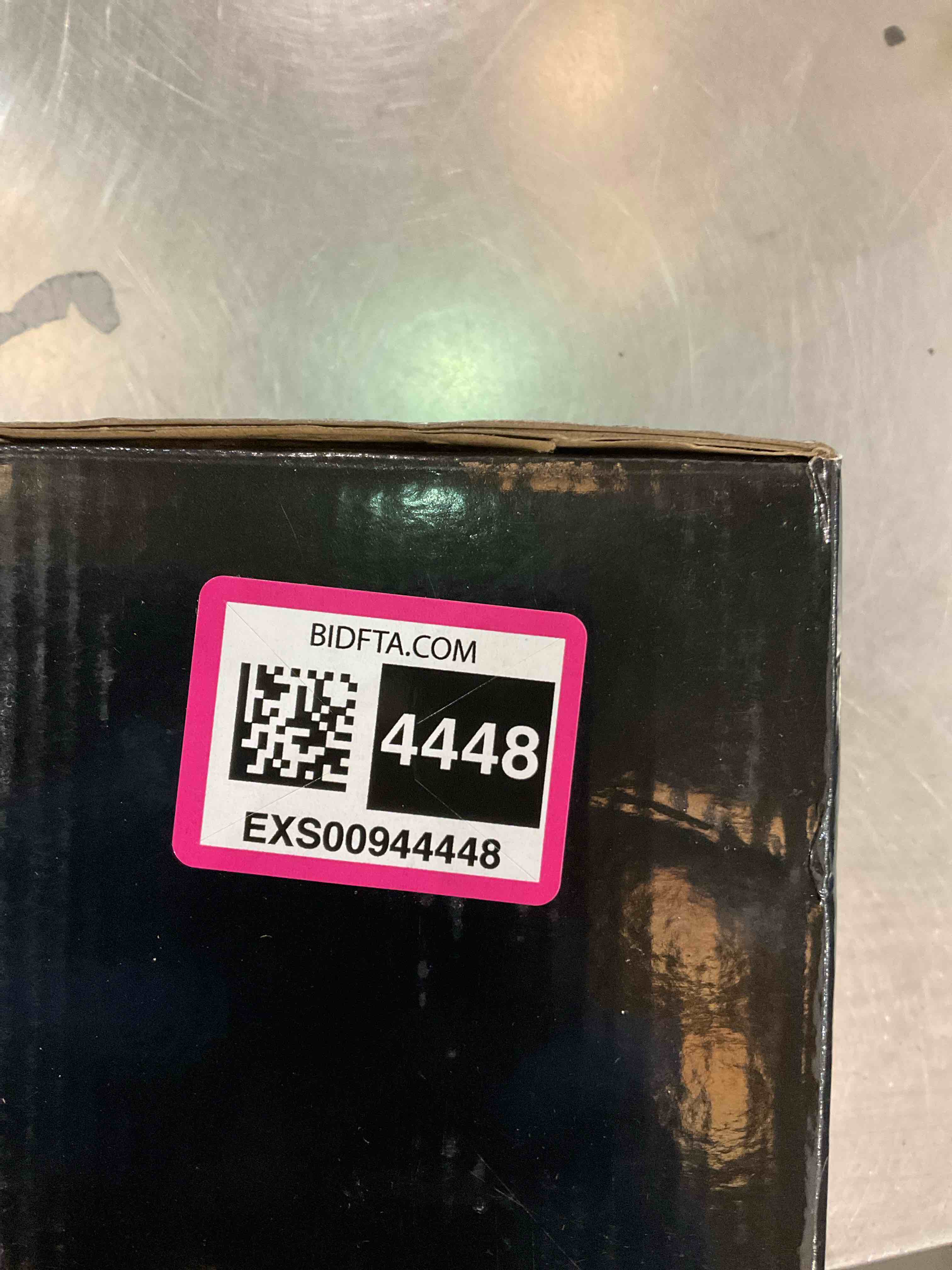 https://s3.amazonaws.com/lotting-images-prod/bidfta/EXS00944448_1703175387757.jpeg