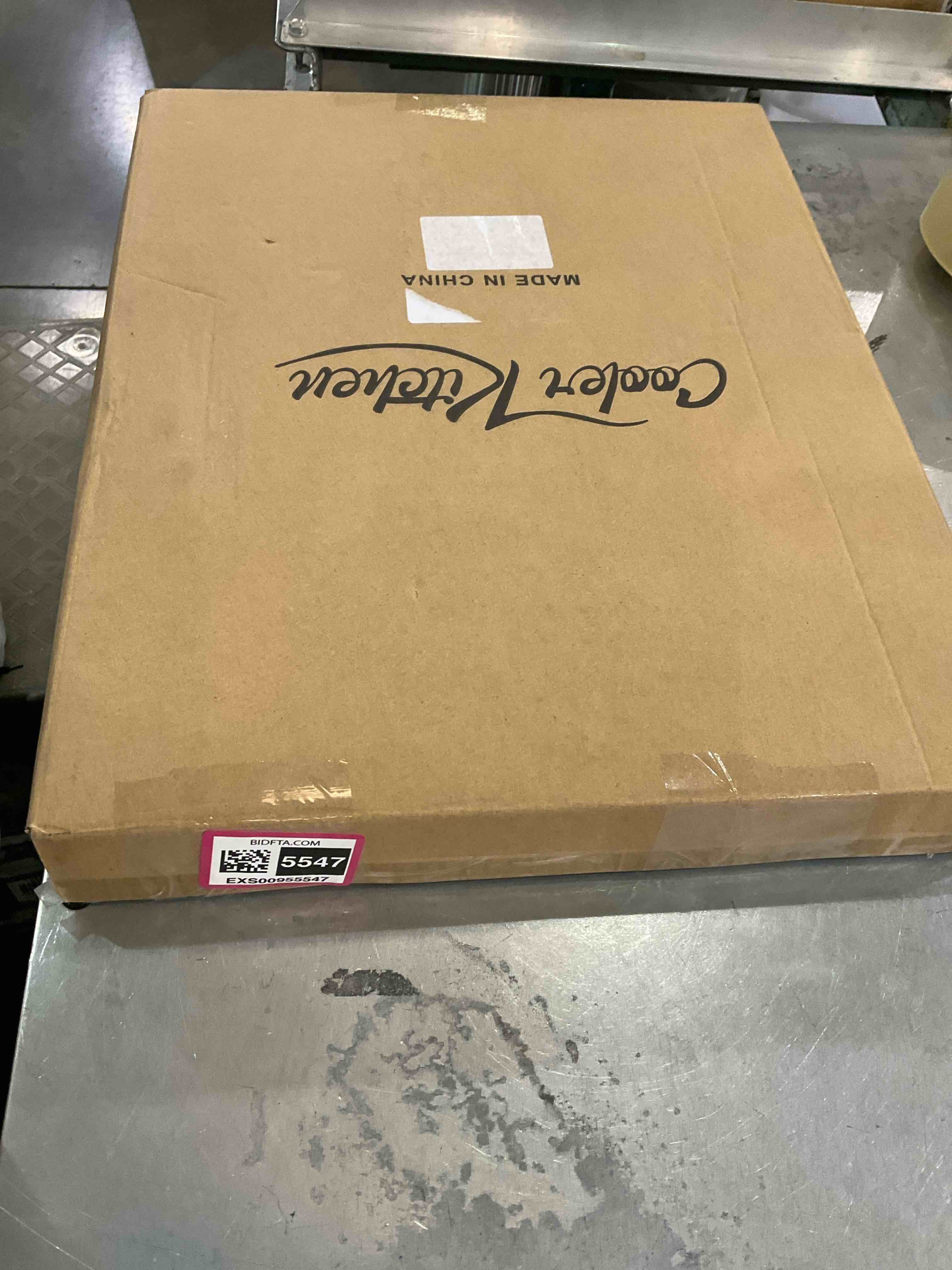 https://s3.amazonaws.com/lotting-images-prod/bidfta/EXS00955547_1704732615551.jpeg