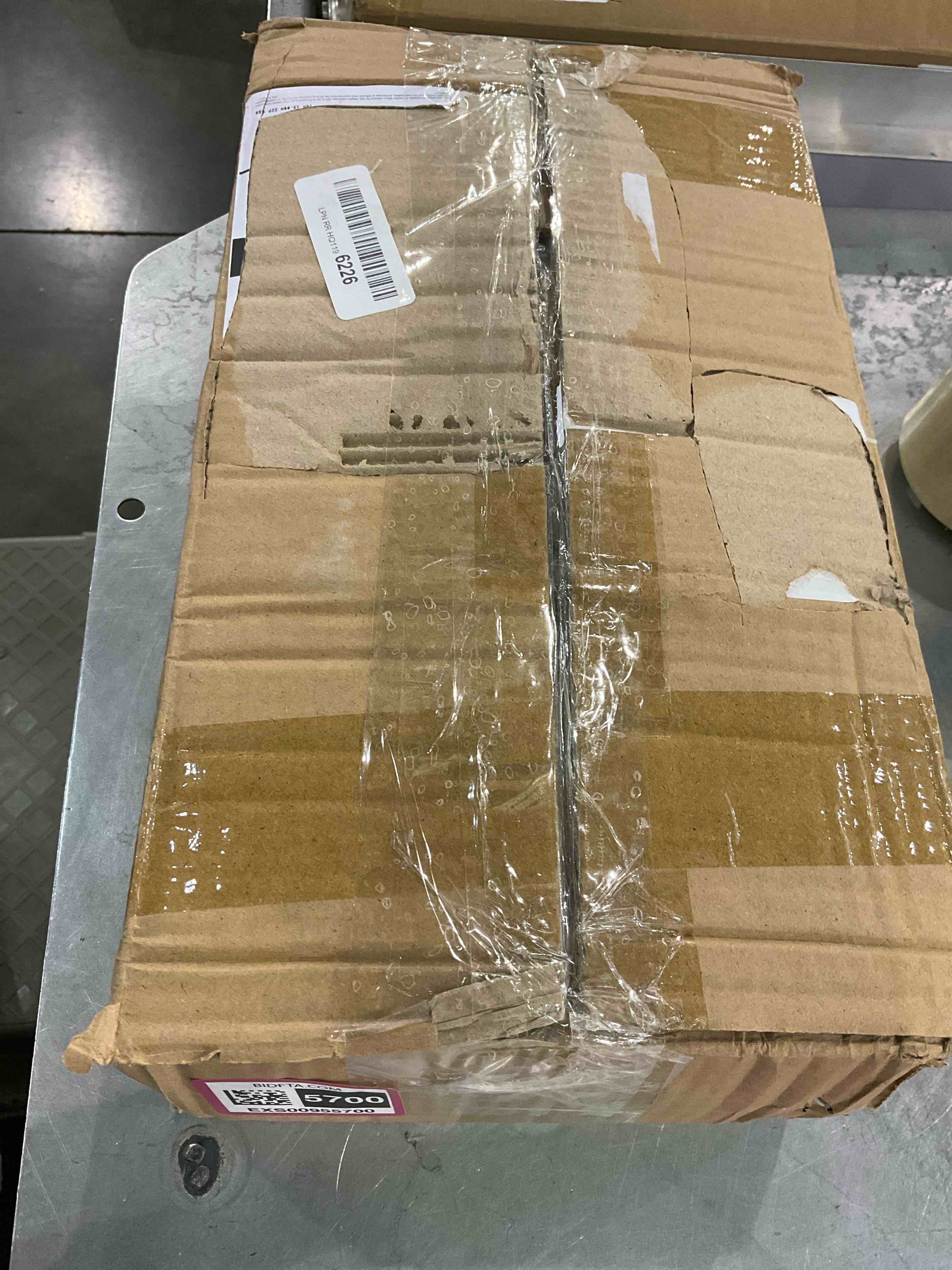 https://s3.amazonaws.com/lotting-images-prod/bidfta/EXS00955700_1704808490571.jpeg