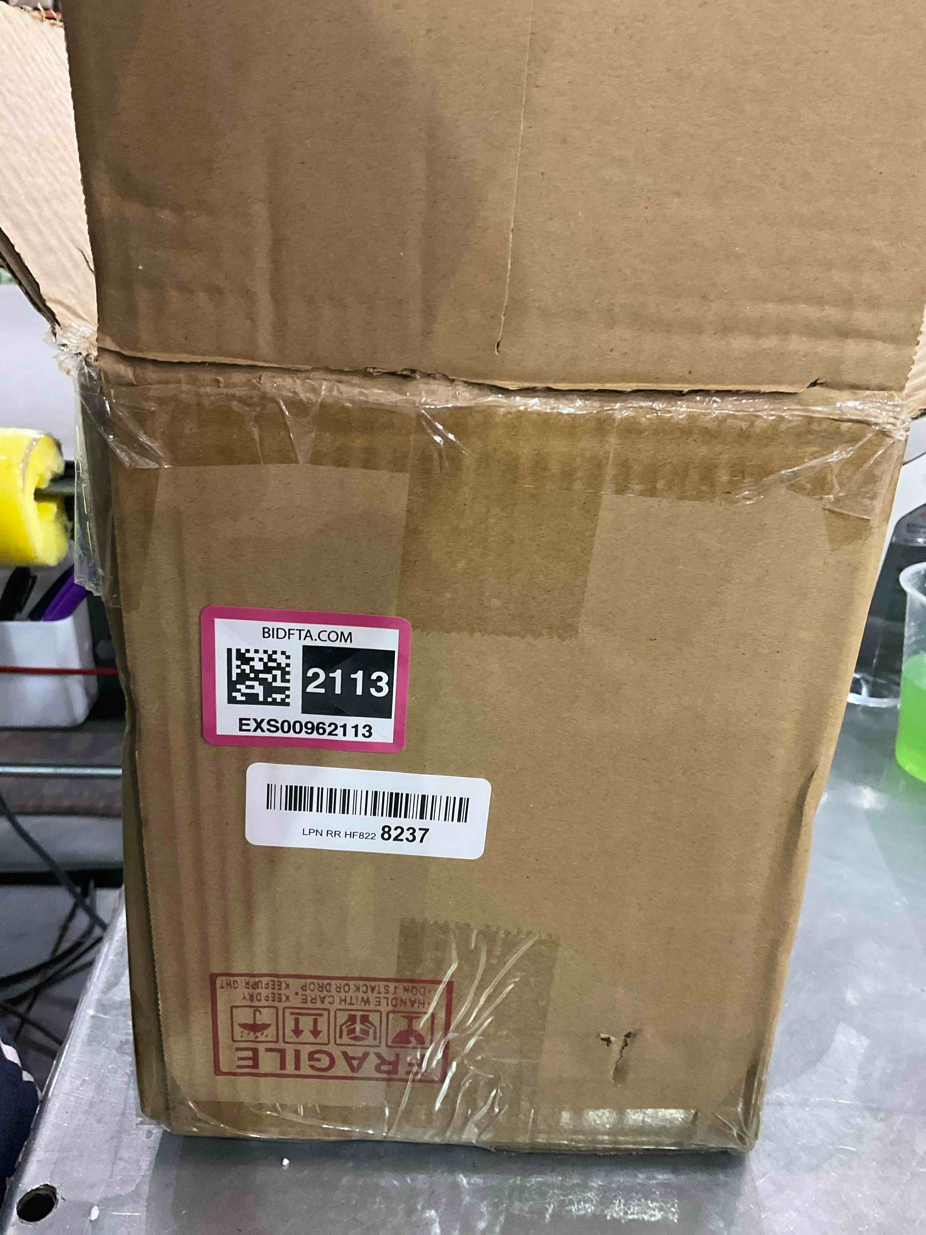 https://s3.amazonaws.com/lotting-images-prod/bidfta/EXS00962113_1702907624452.jpeg