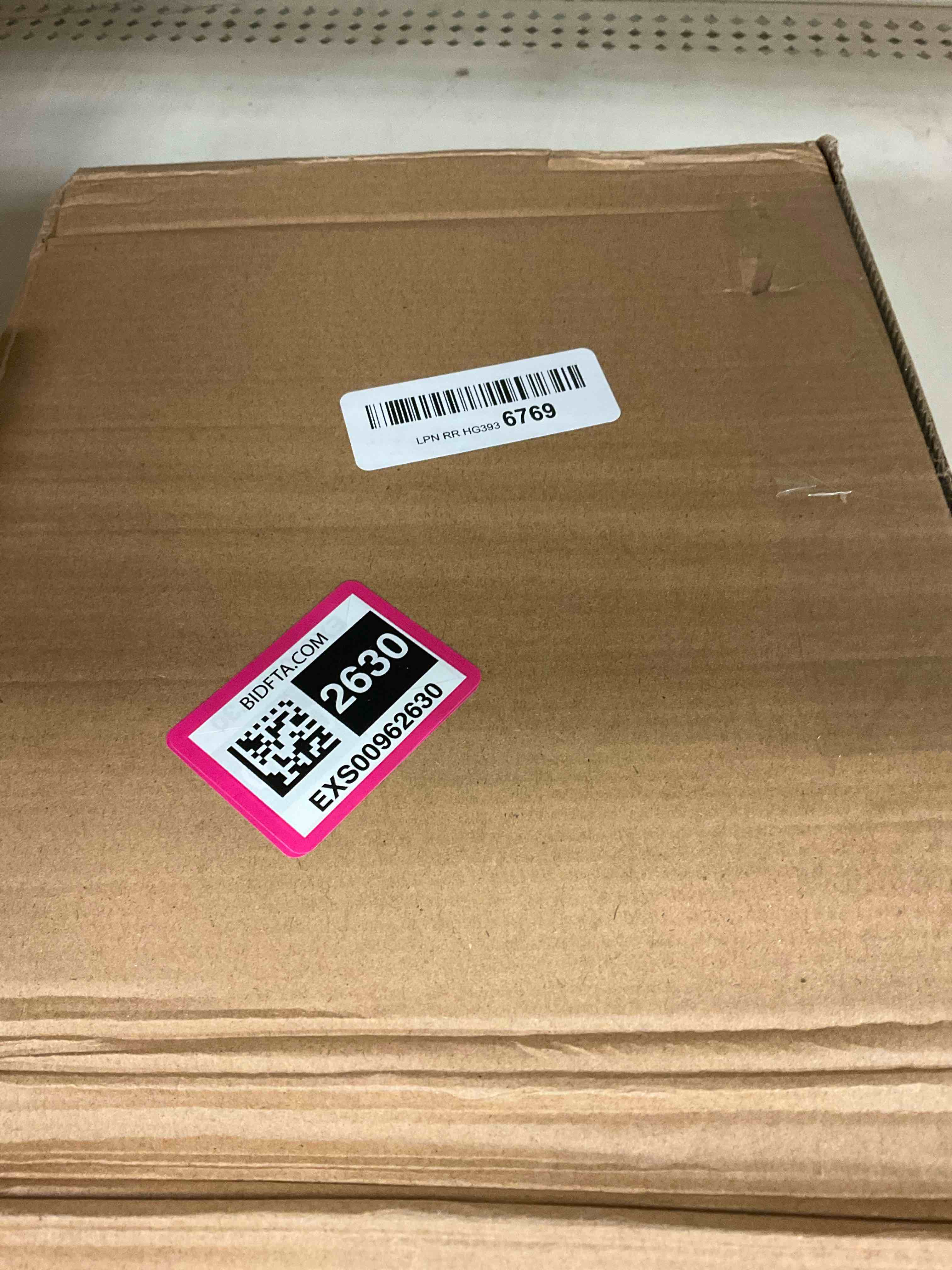 https://s3.amazonaws.com/lotting-images-prod/bidfta/EXS00962630_1703281823580.jpeg