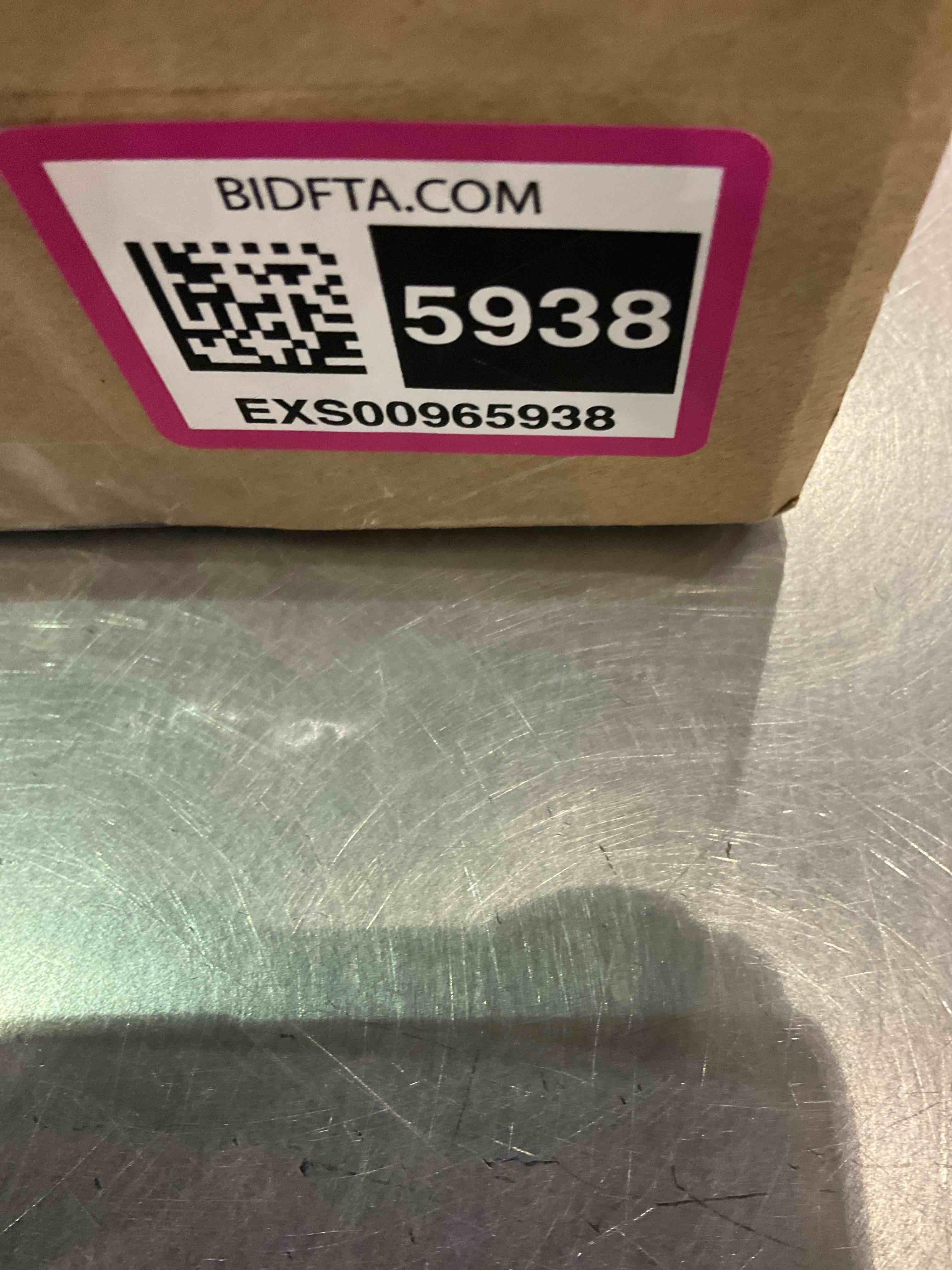https://s3.amazonaws.com/lotting-images-prod/bidfta/EXS00965938_1704370890344.jpeg