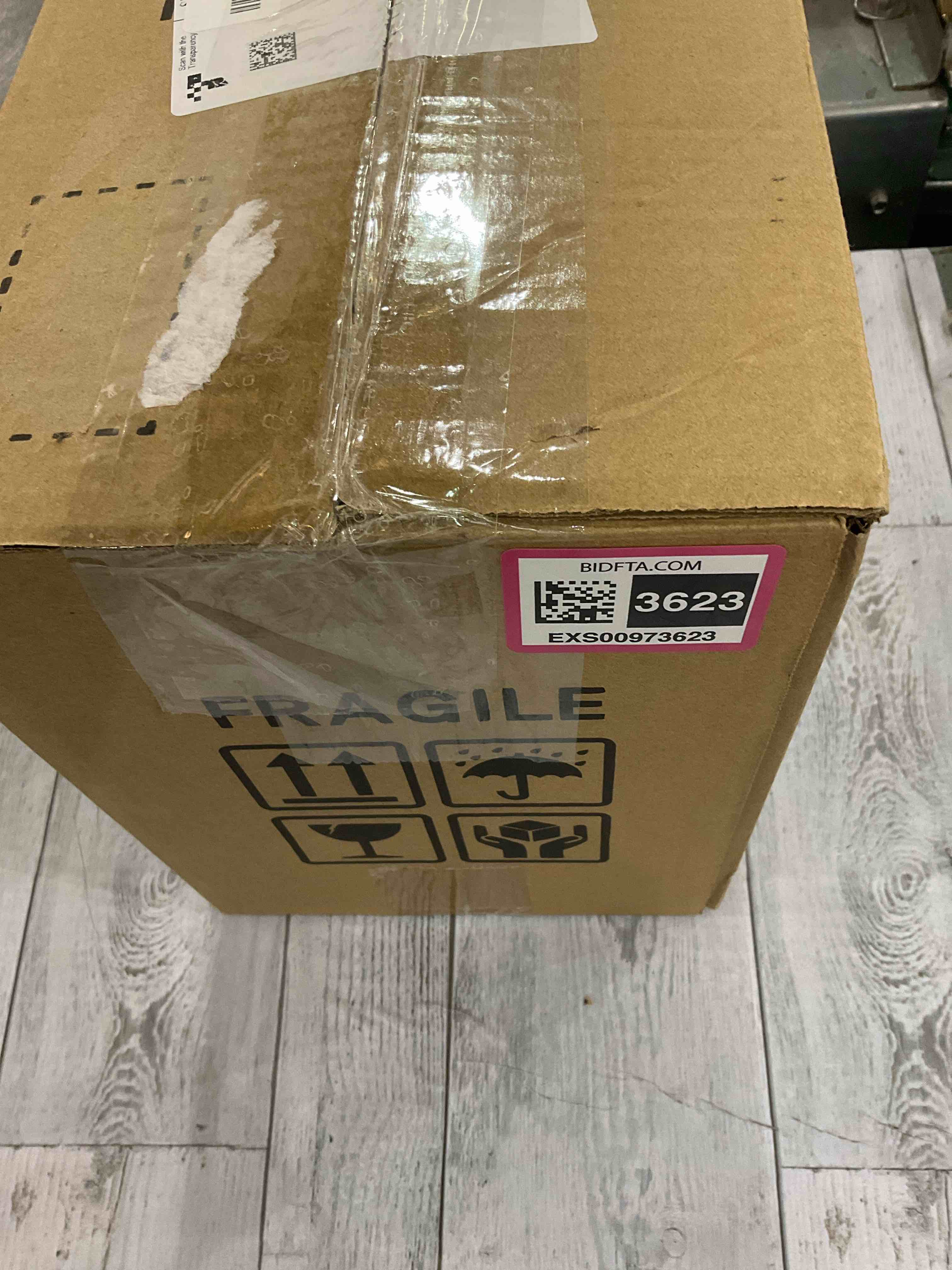 https://s3.amazonaws.com/lotting-images-prod/bidfta/EXS00973623_1704984069488.jpeg