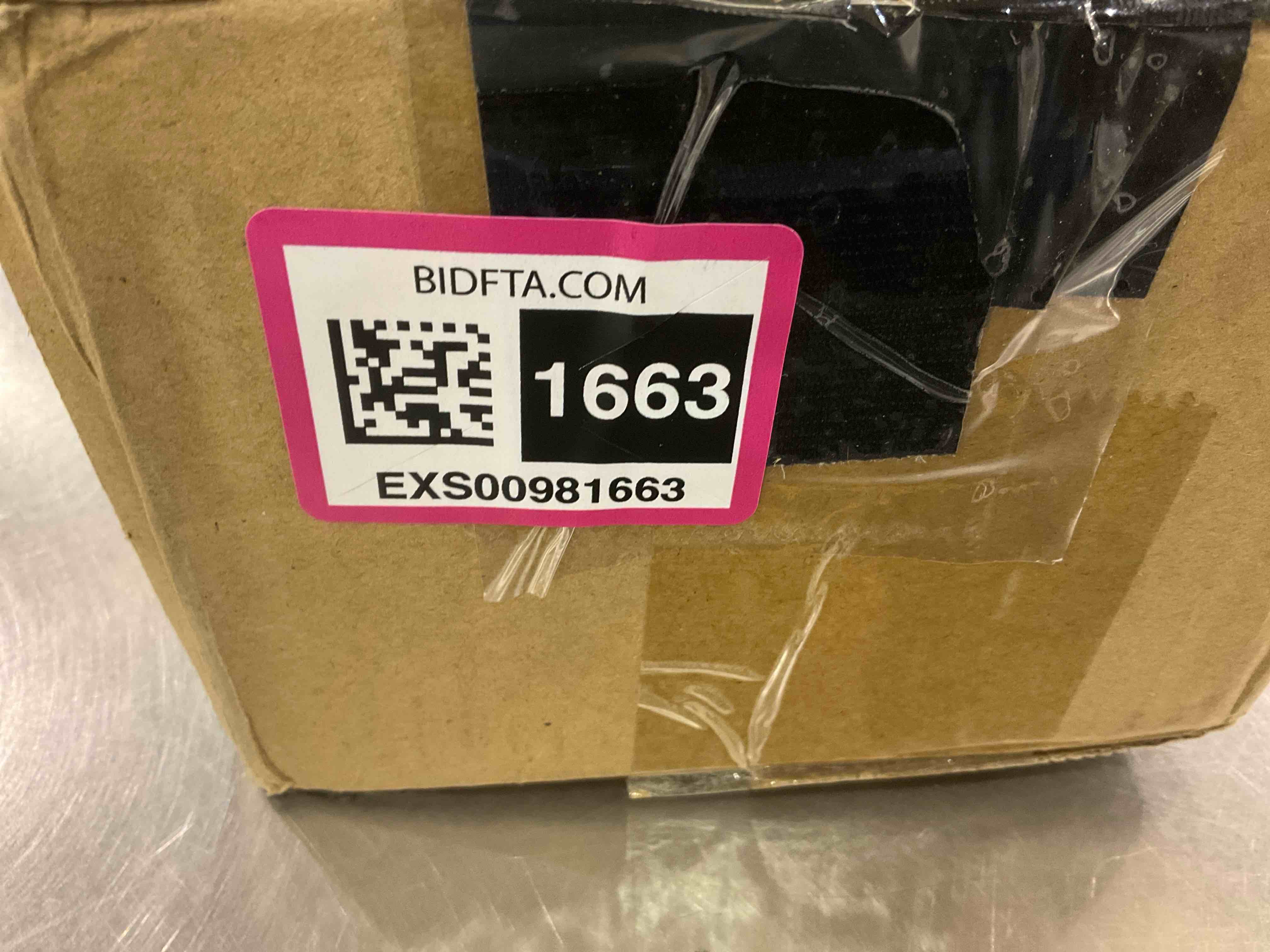 https://s3.amazonaws.com/lotting-images-prod/bidfta/EXS00981663_1704294713601.jpeg