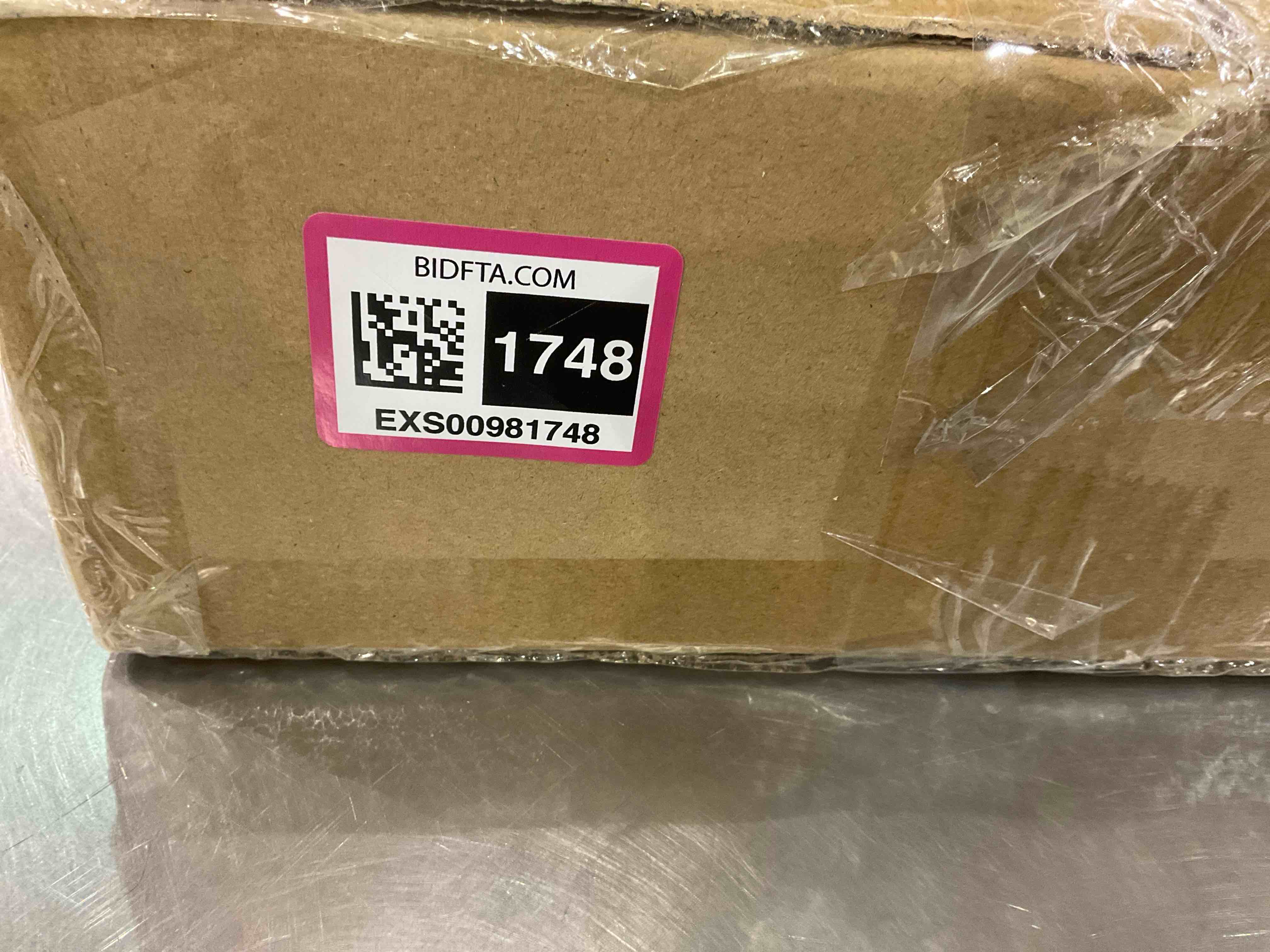 https://s3.amazonaws.com/lotting-images-prod/bidfta/EXS00981748_1704370602983.jpeg