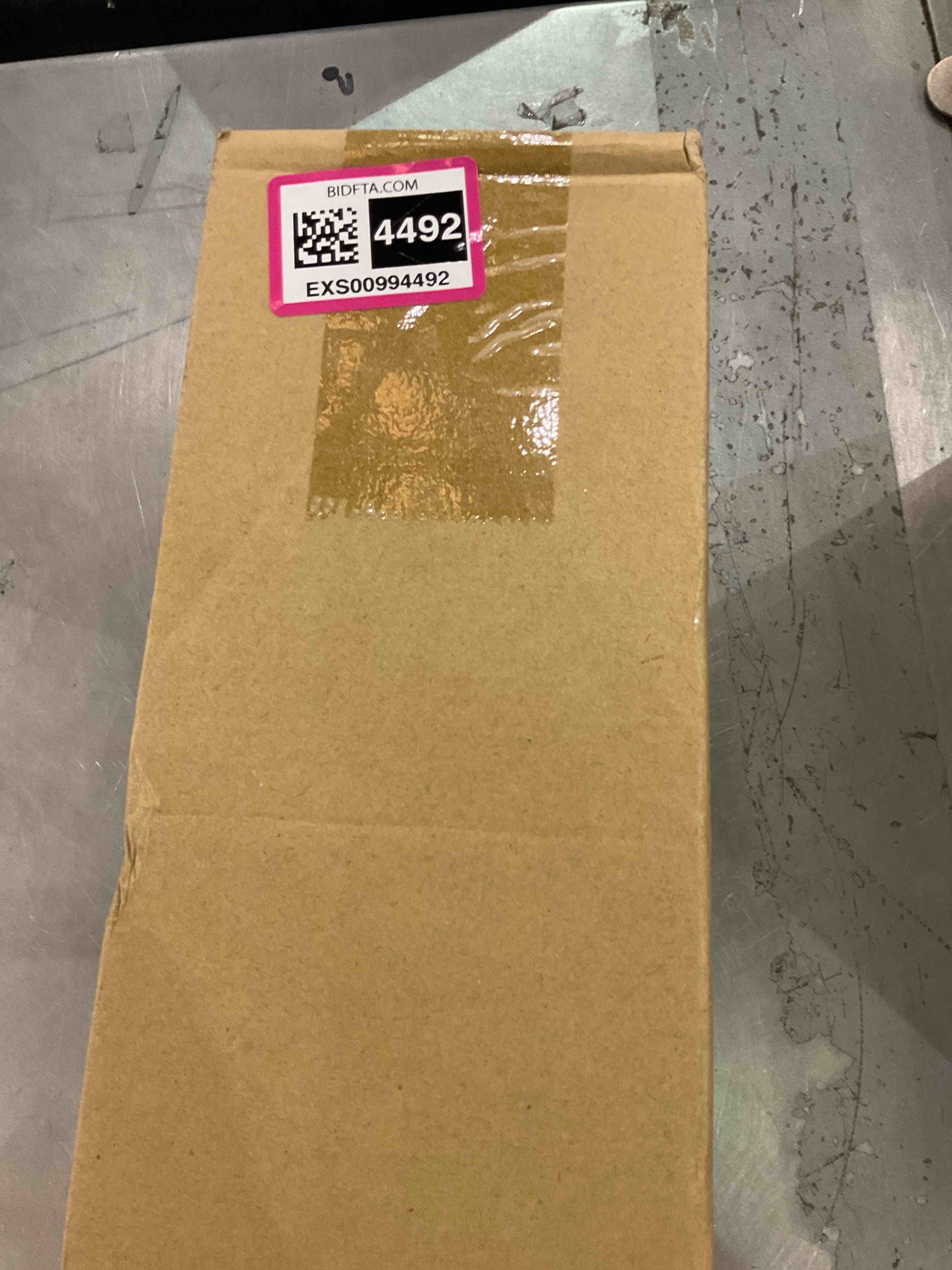 https://s3.amazonaws.com/lotting-images-prod/bidfta/EXS00994492_1704909103172.jpeg