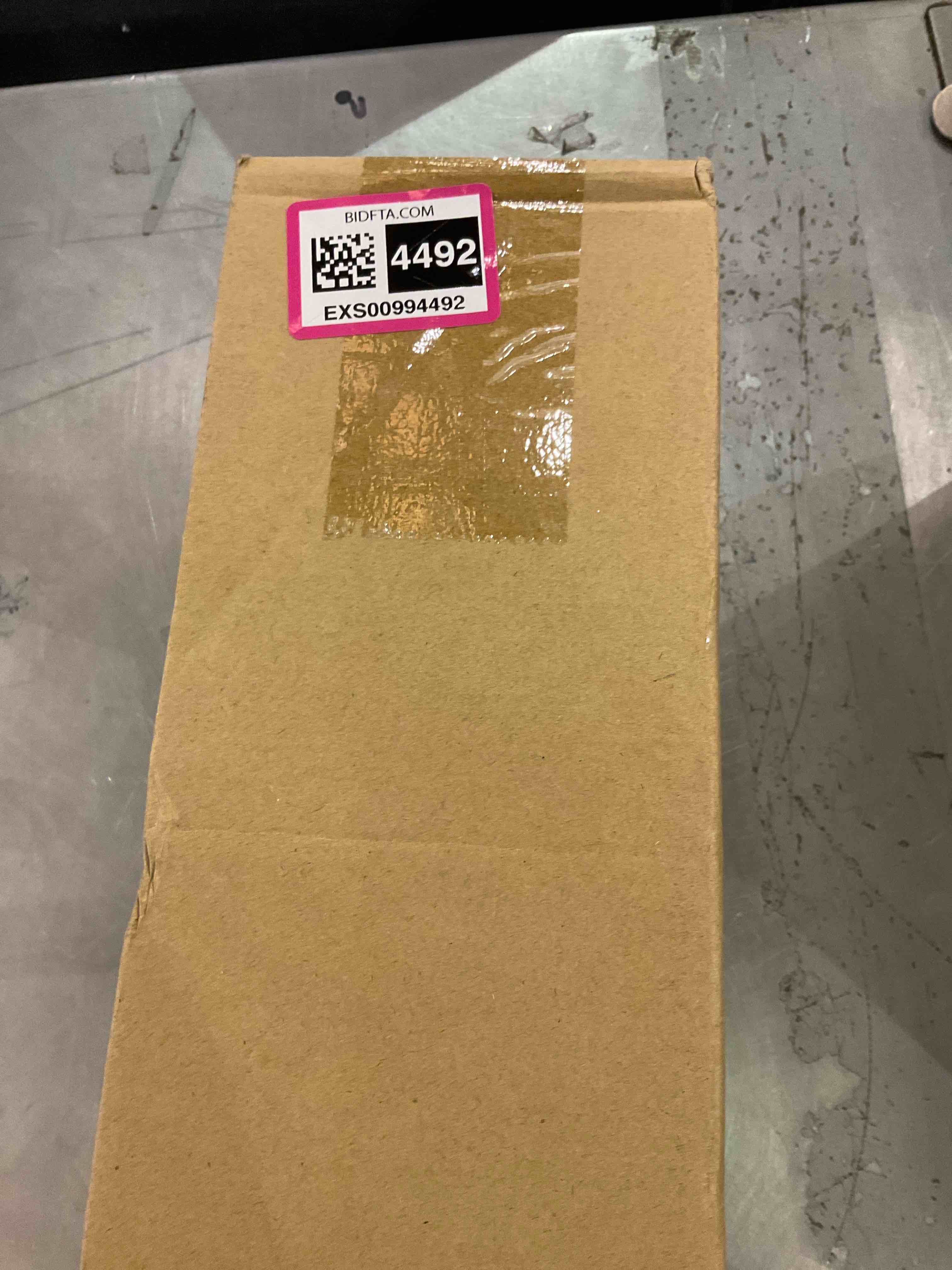 https://s3.amazonaws.com/lotting-images-prod/bidfta/EXS00994492_1704909104447.jpeg