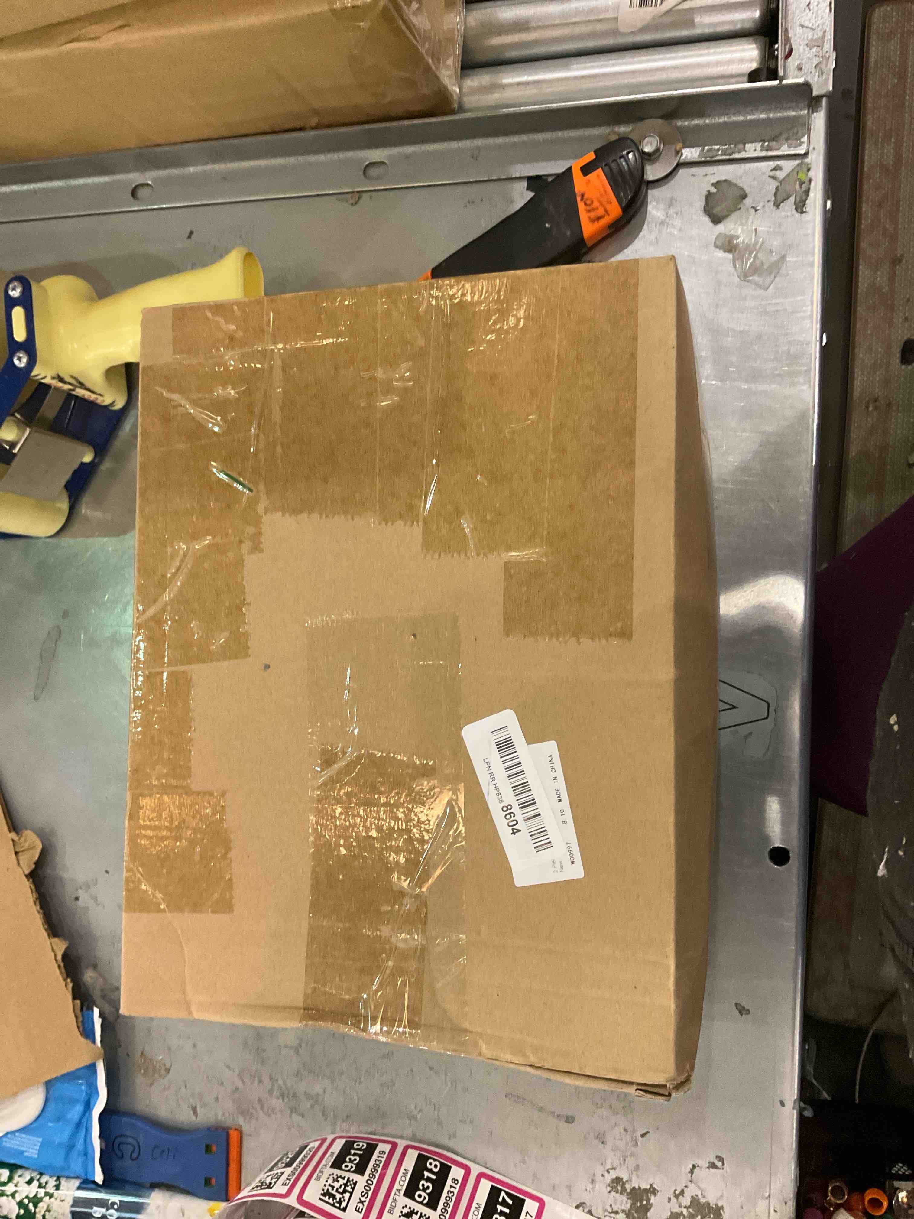 https://s3.amazonaws.com/lotting-images-prod/bidfta/EXS00999317_1704471007459.jpeg