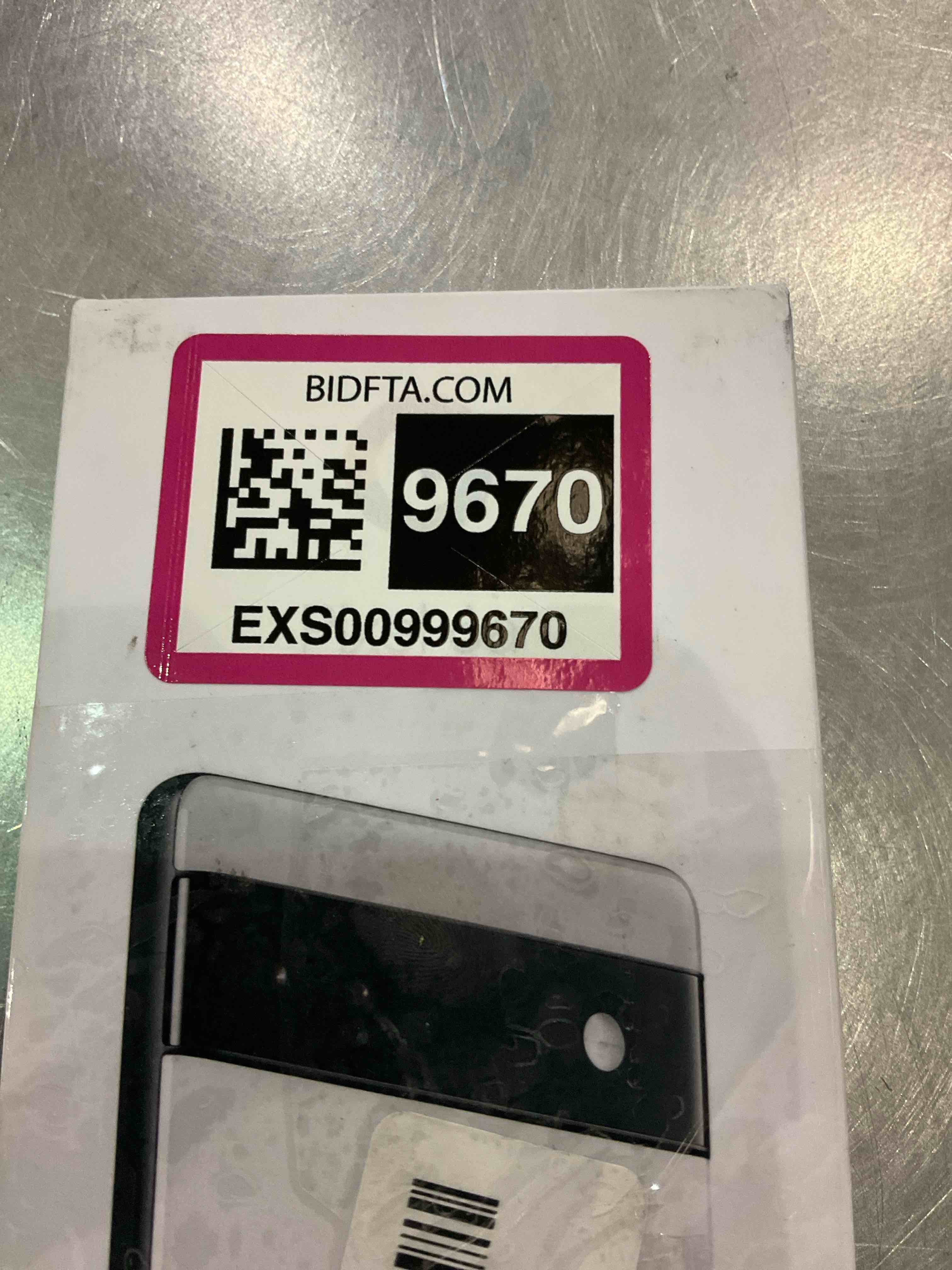 https://s3.amazonaws.com/lotting-images-prod/bidfta/EXS00999670_1704902696676.jpeg