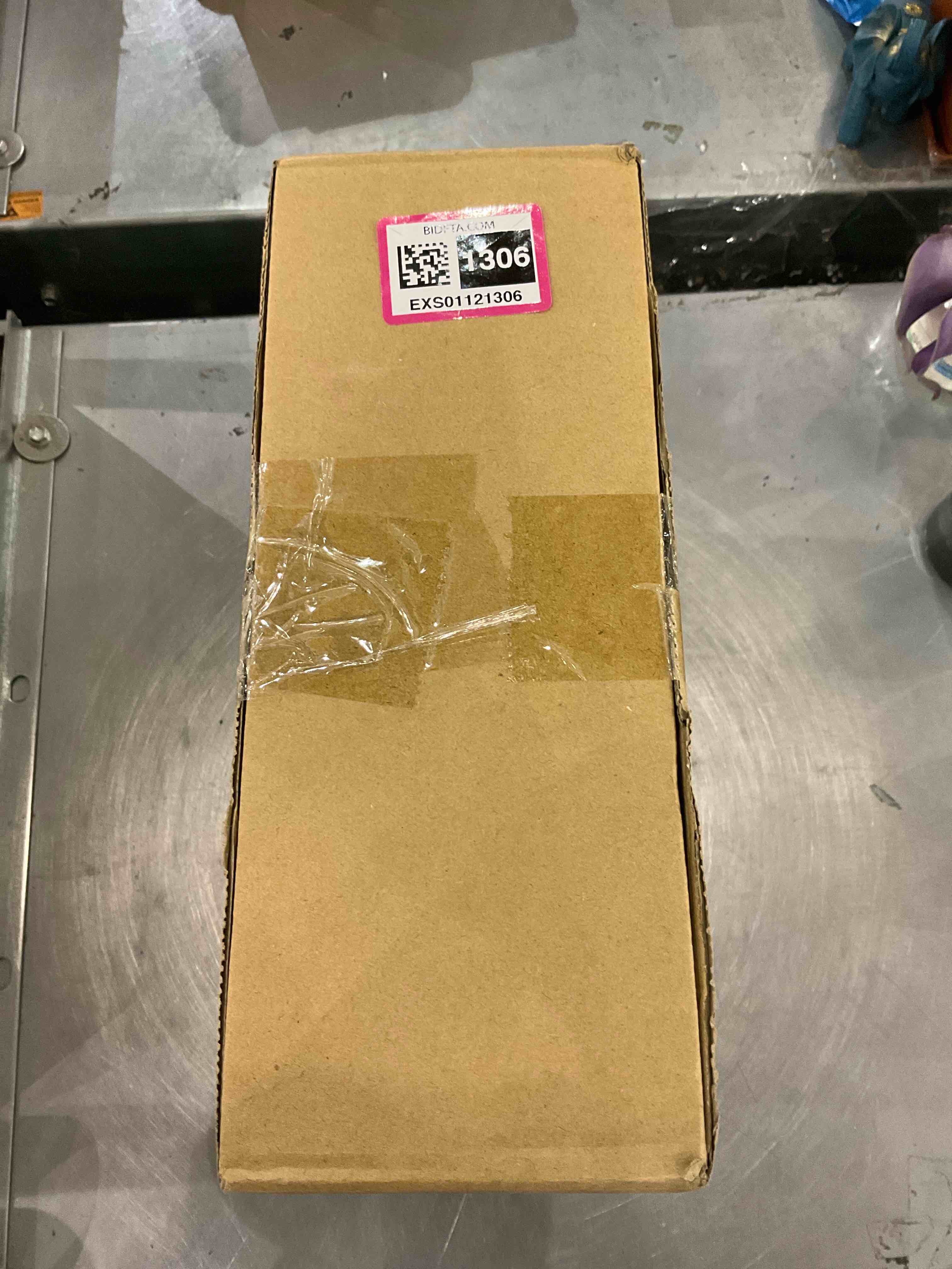 https://s3.amazonaws.com/lotting-images-prod/bidfta/EXS01121306_1706099809663.jpeg
