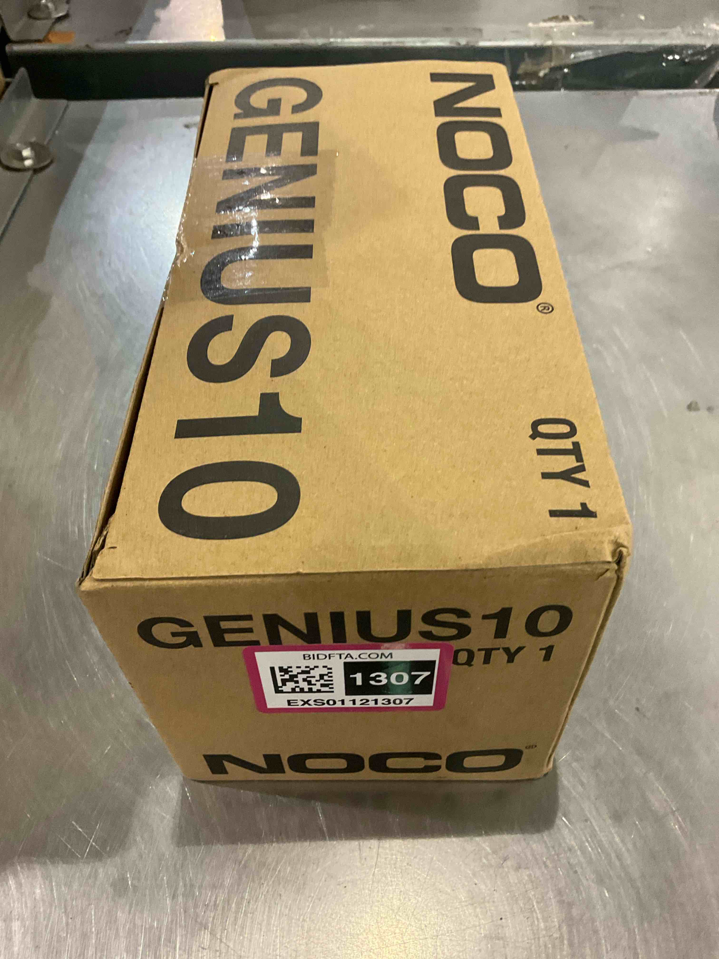 https://s3.amazonaws.com/lotting-images-prod/bidfta/EXS01121307_1706099850204.jpeg