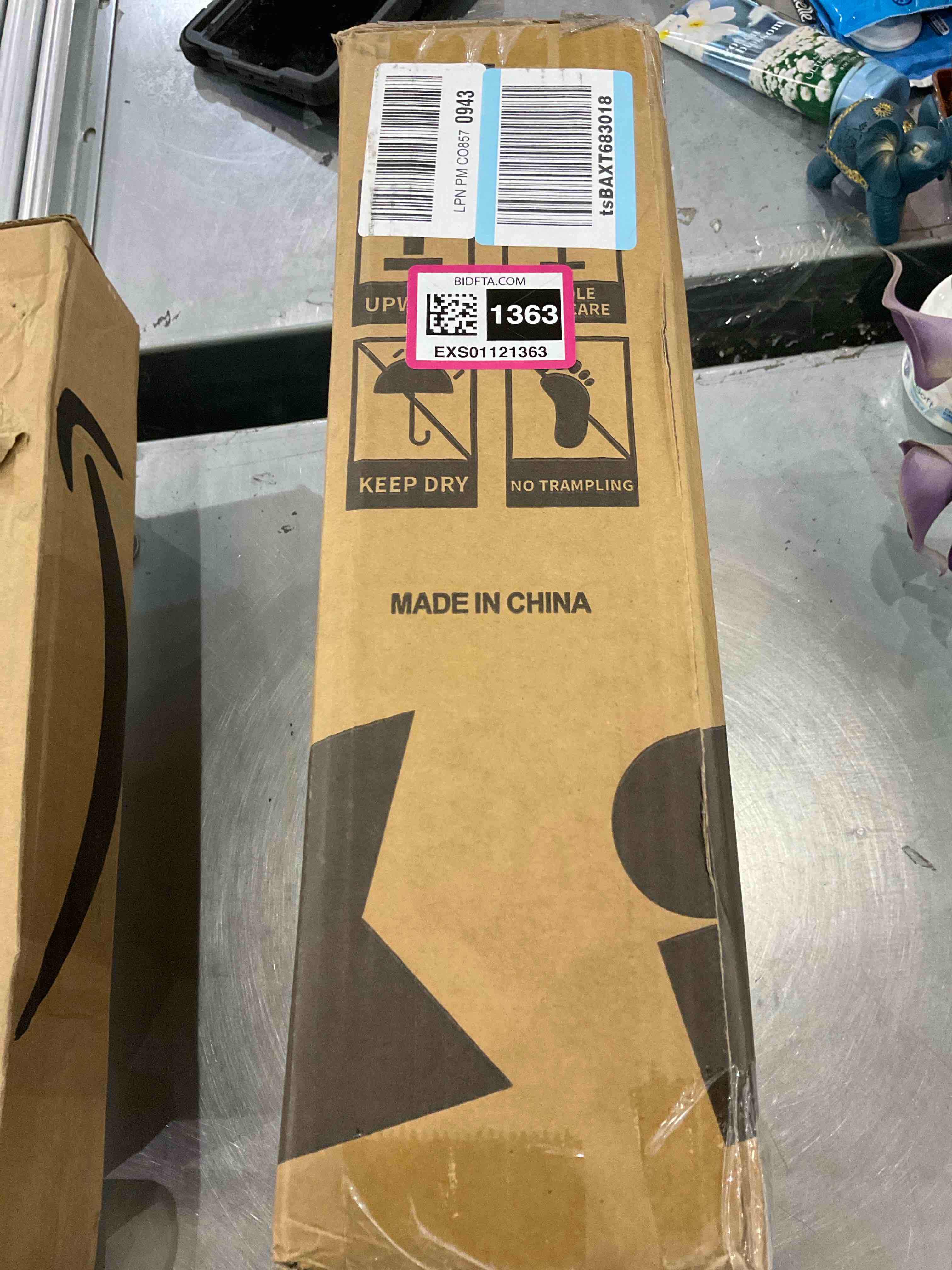 https://s3.amazonaws.com/lotting-images-prod/bidfta/EXS01121363_1706109073641.jpeg